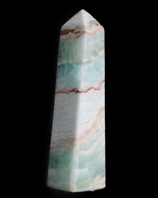 Pistachio Calcite obelisk 155mm 465g in sunlight - Rocks and Things Store