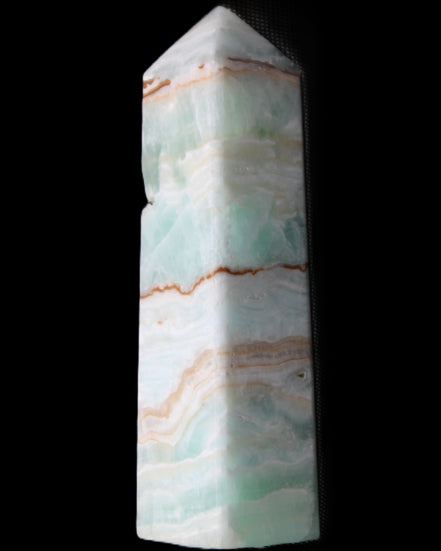 Pistachio Calcite obelisk 134mm 339g in sunlight - Rocks and Things Store