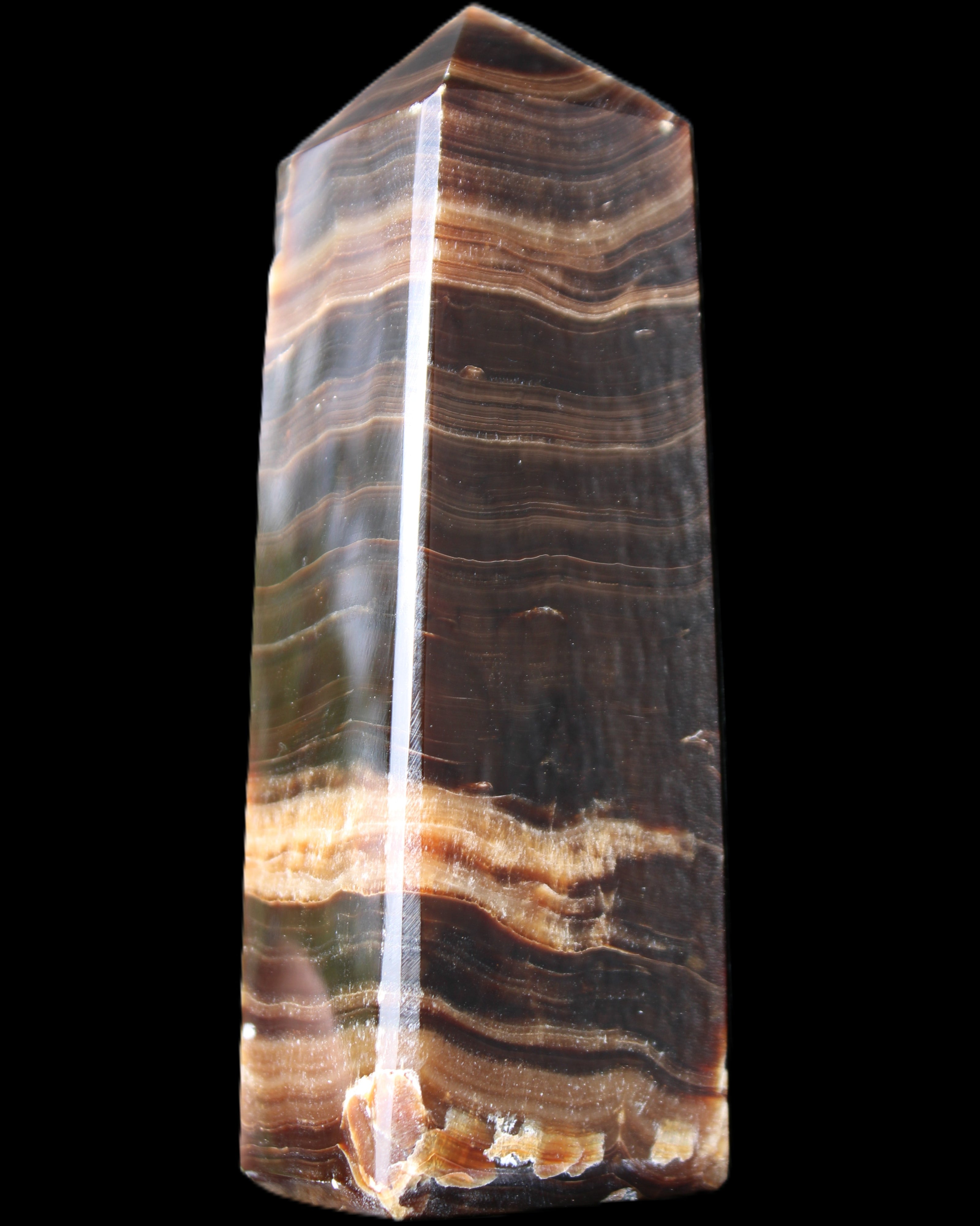 Chocolate Calcite obelisk 120*40*30mm 359g in sunlight - Rocks and Things Store