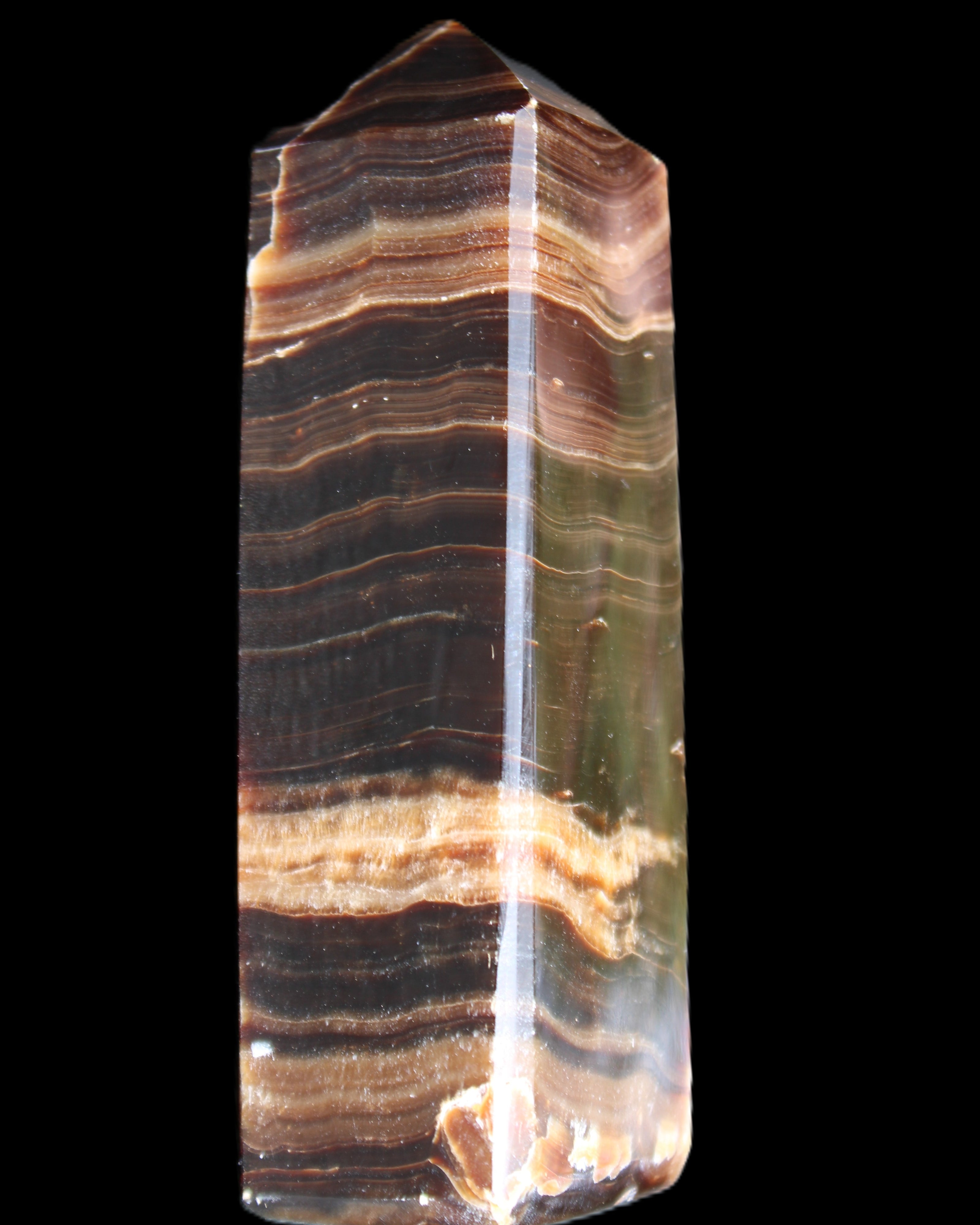 Chocolate Calcite obelisk 120*40*30mm 359g in sunlight - Rocks and Things Store