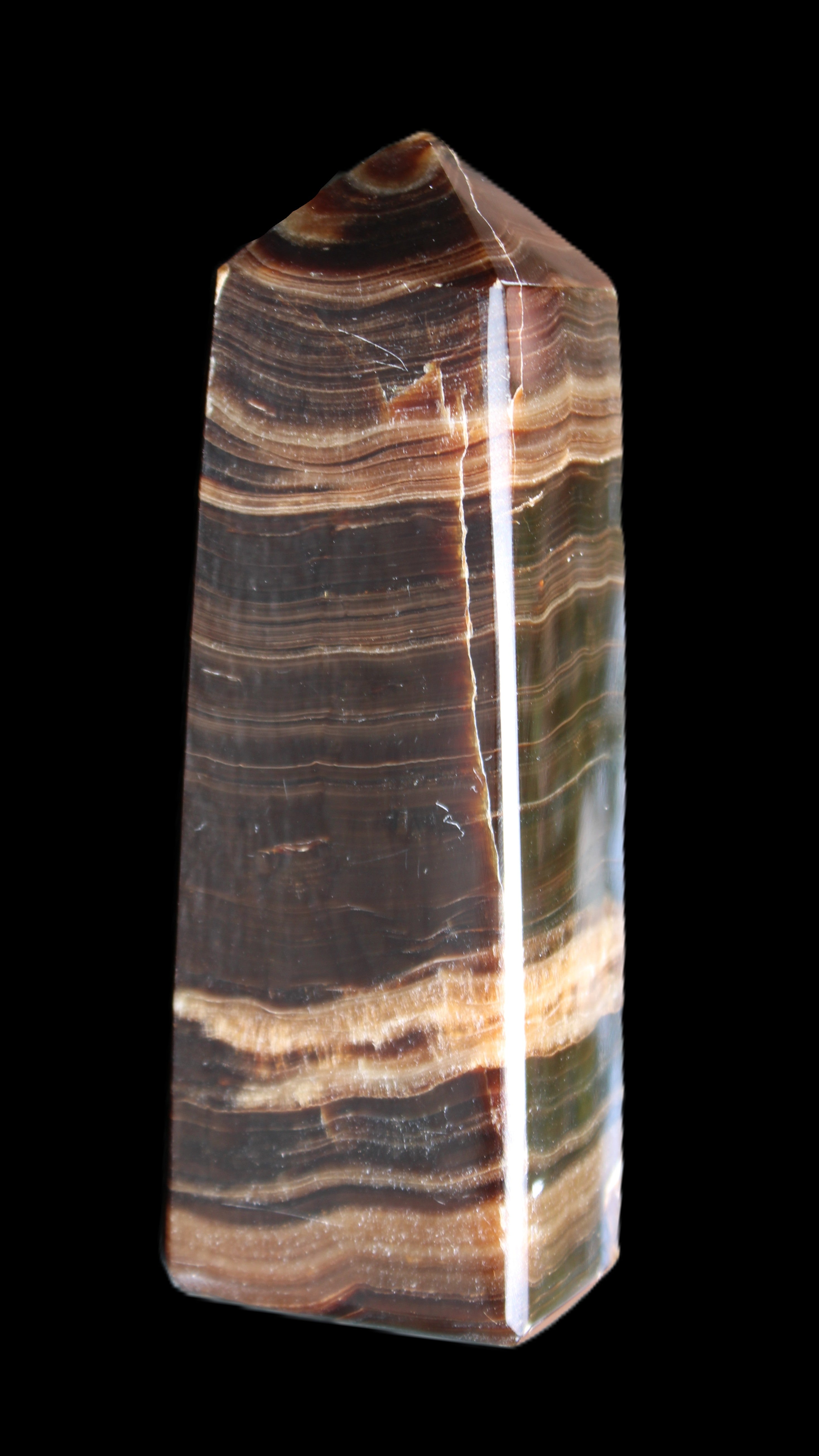 Chocolate Calcite obelisk 120*40*30mm 359g in sunlight - Rocks and Things Store