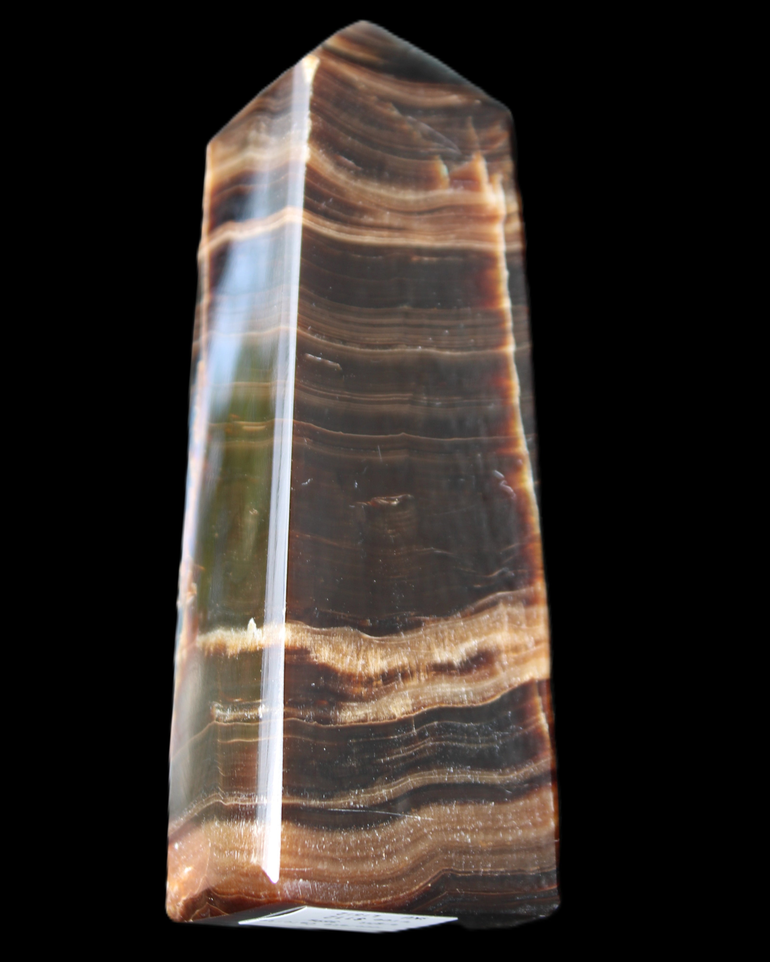 Chocolate Calcite obelisk 120*40*30mm 359g in sunlight - Rocks and Things Store