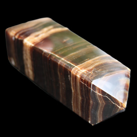 Chocolate Calcite obelisk 120*40*30mm 359g in sunlight - Rocks and Things Store