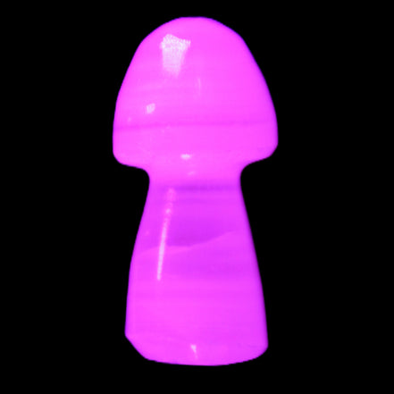 Mangano Calcite mushroom 25-32mmm 8-15g in UV light - Rocks and Things Store