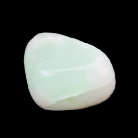 Pistachio Calcite tumbled stone 14-24g in sunlight - Rocks and Things Store
