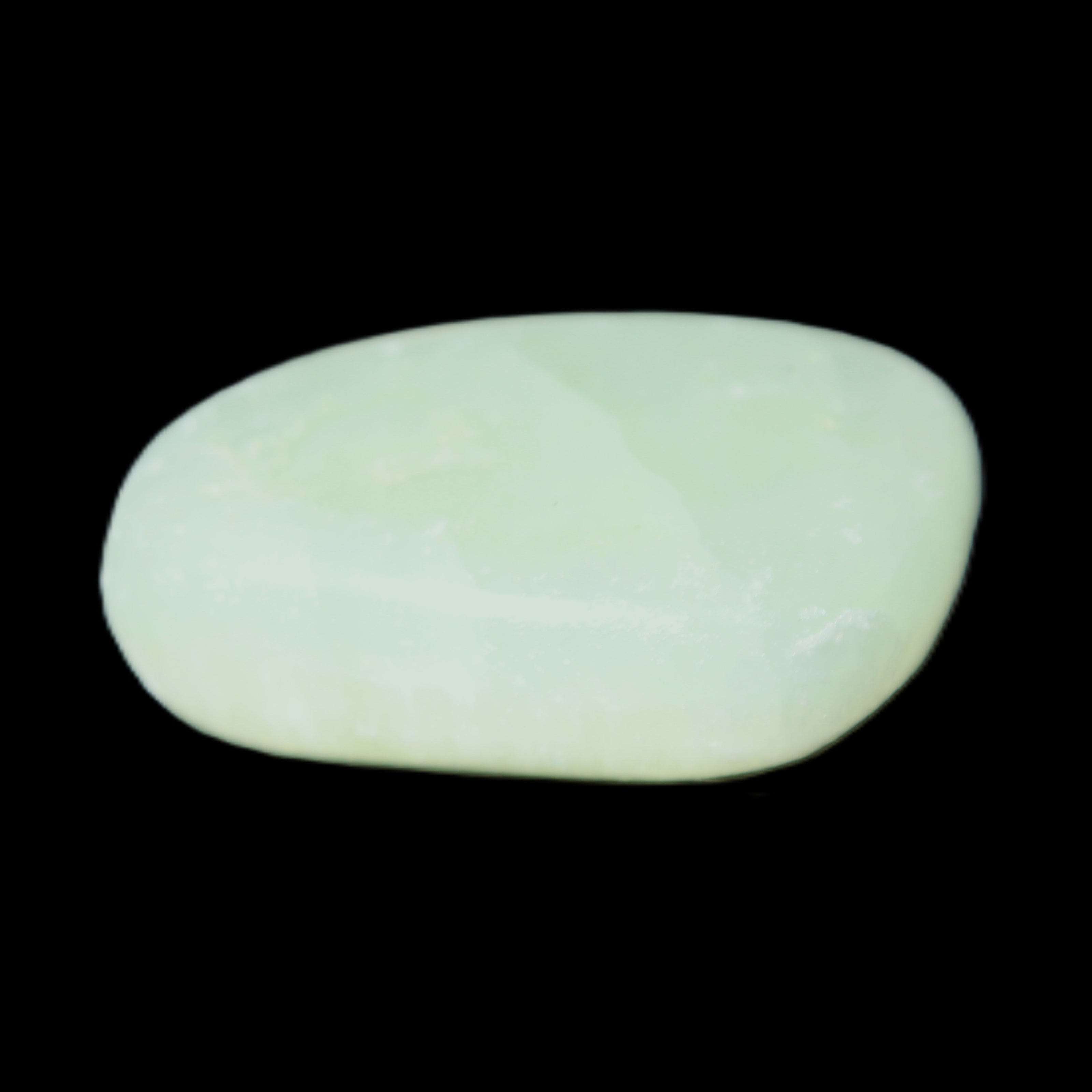 Pistachio Calcite tumbled stone 20-28mm 11-19g in sunlight - Rocks and Things Store