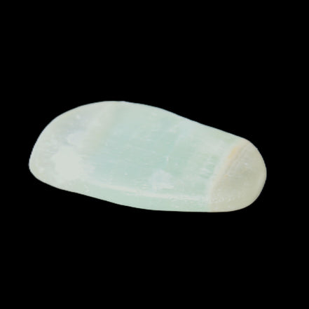 Pistachio Calcite tumbled stone 15-26mm 10-15g in sunlight - Rocks and Things Store