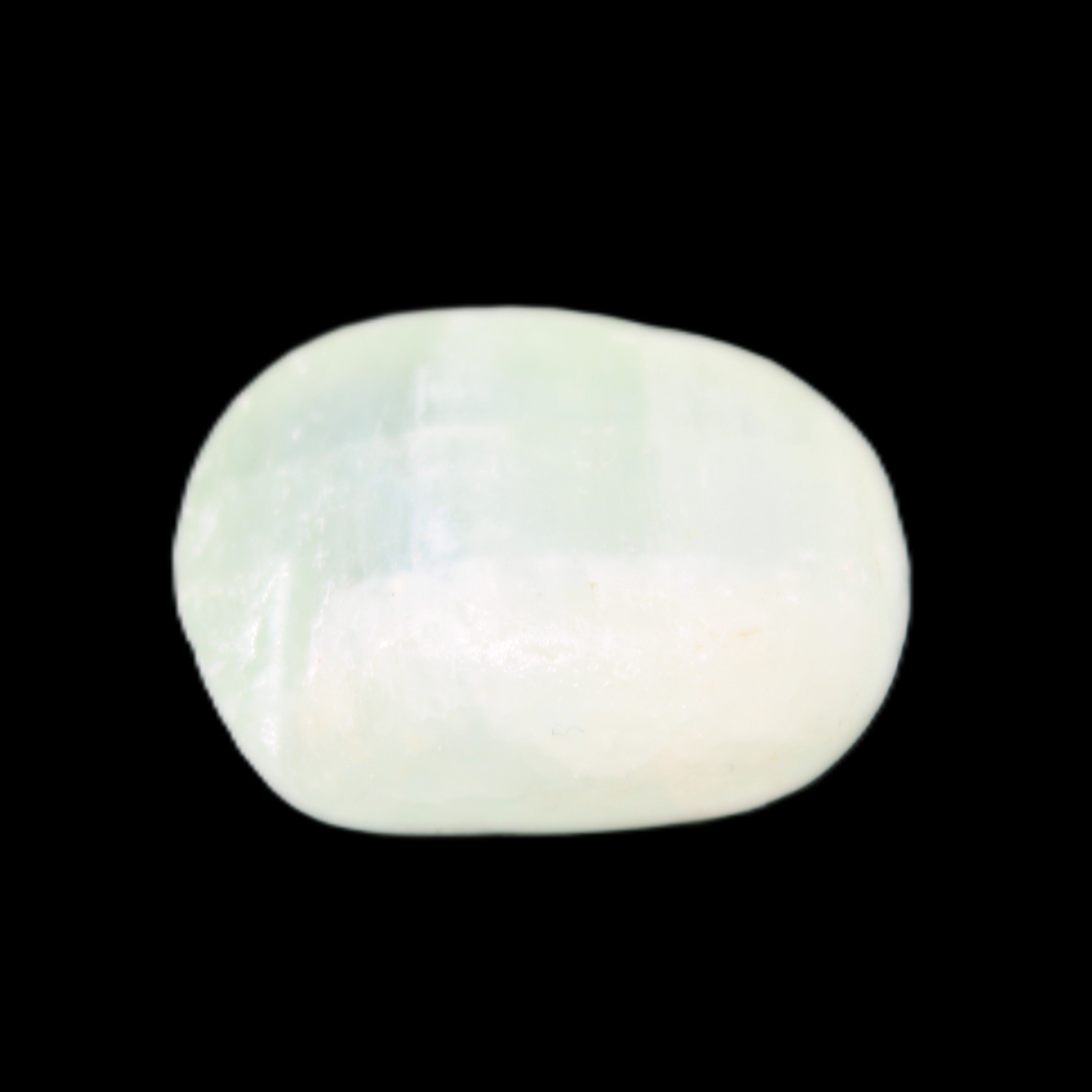 Pistachio Calcite tumbled stone 15-26mm 10-15g in sunlight - Rocks and Things Store