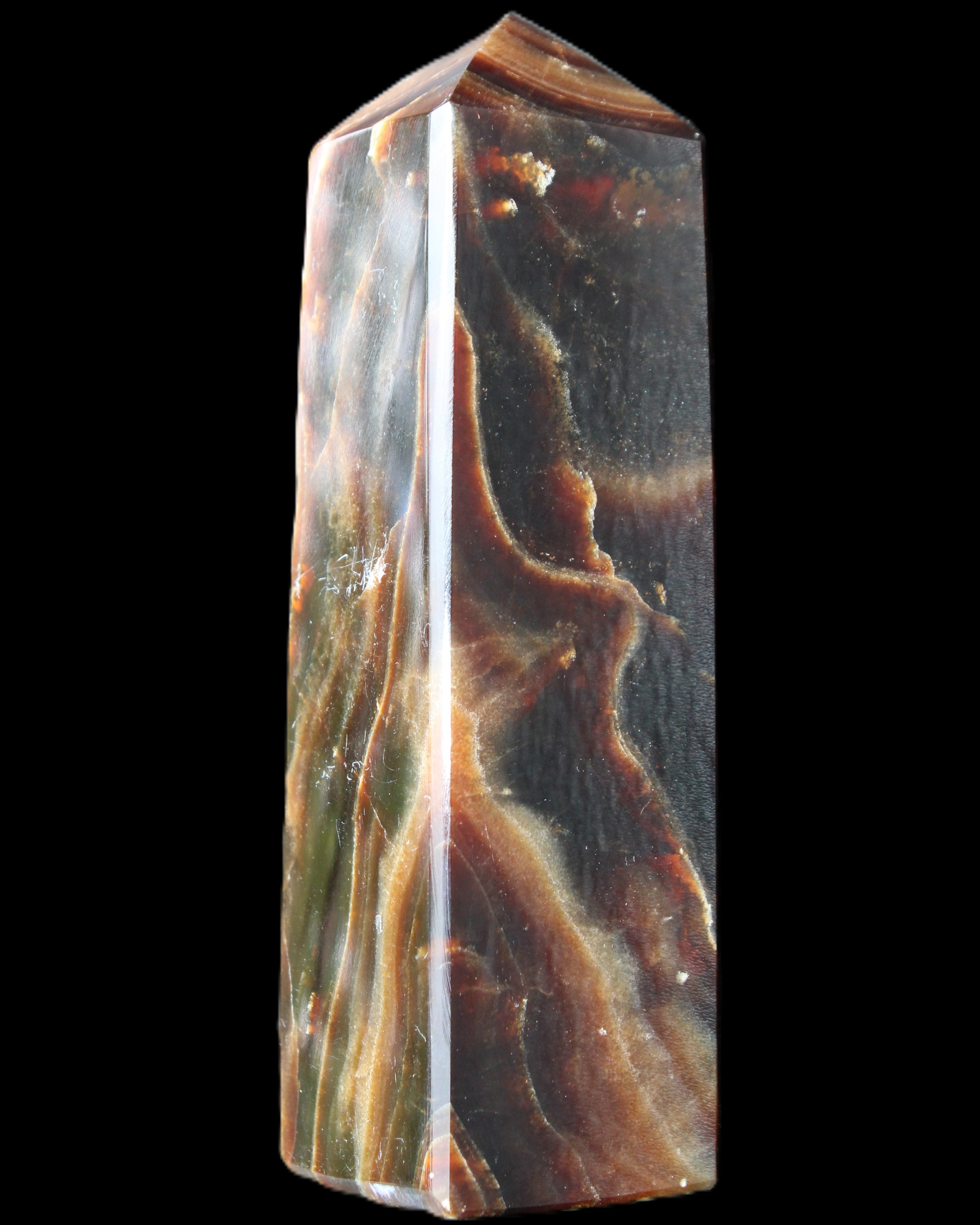 Chocolate Calcite obelisk 120*33*32mm 332g in sunlight - Rocks and Things Store