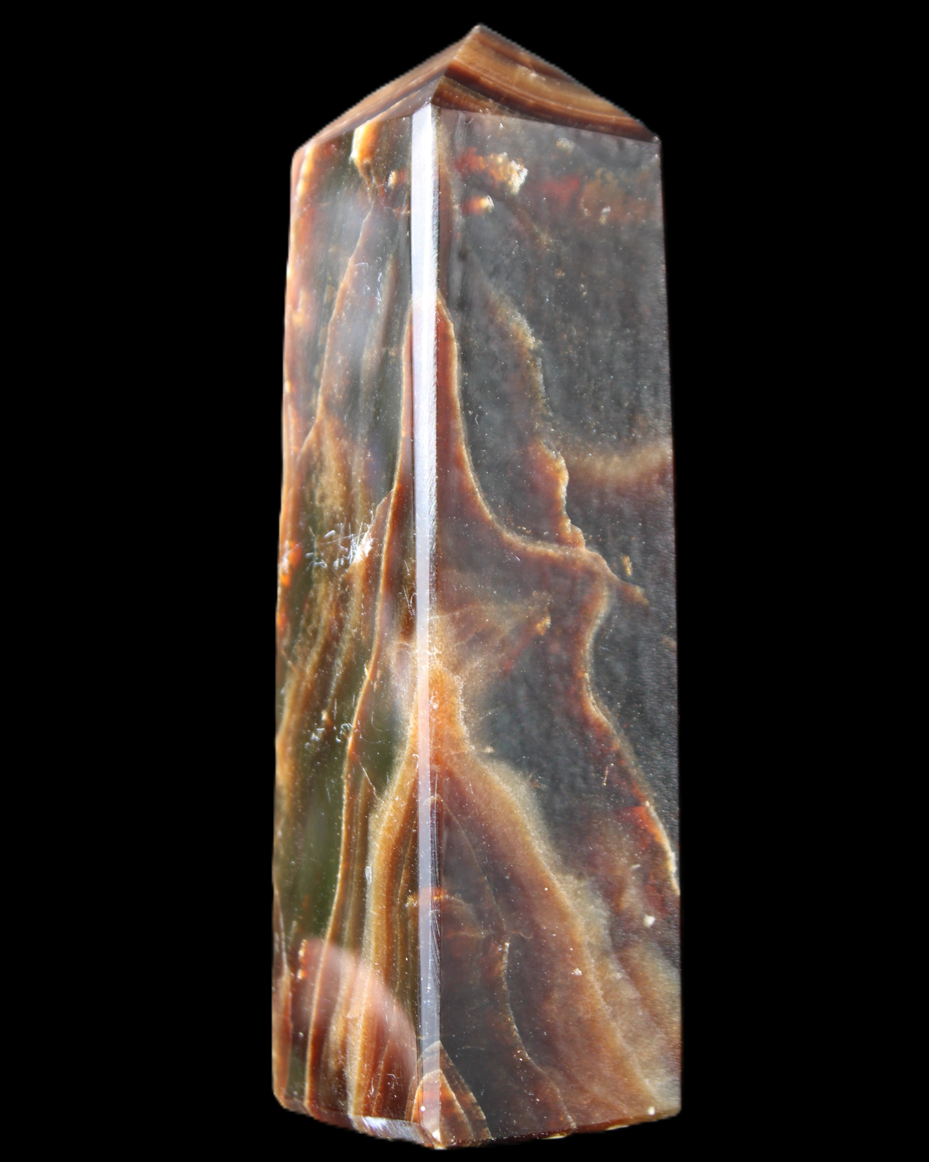 Chocolate Calcite obelisk 120*33*32mm 332g in sunlight - Rocks and Things Store