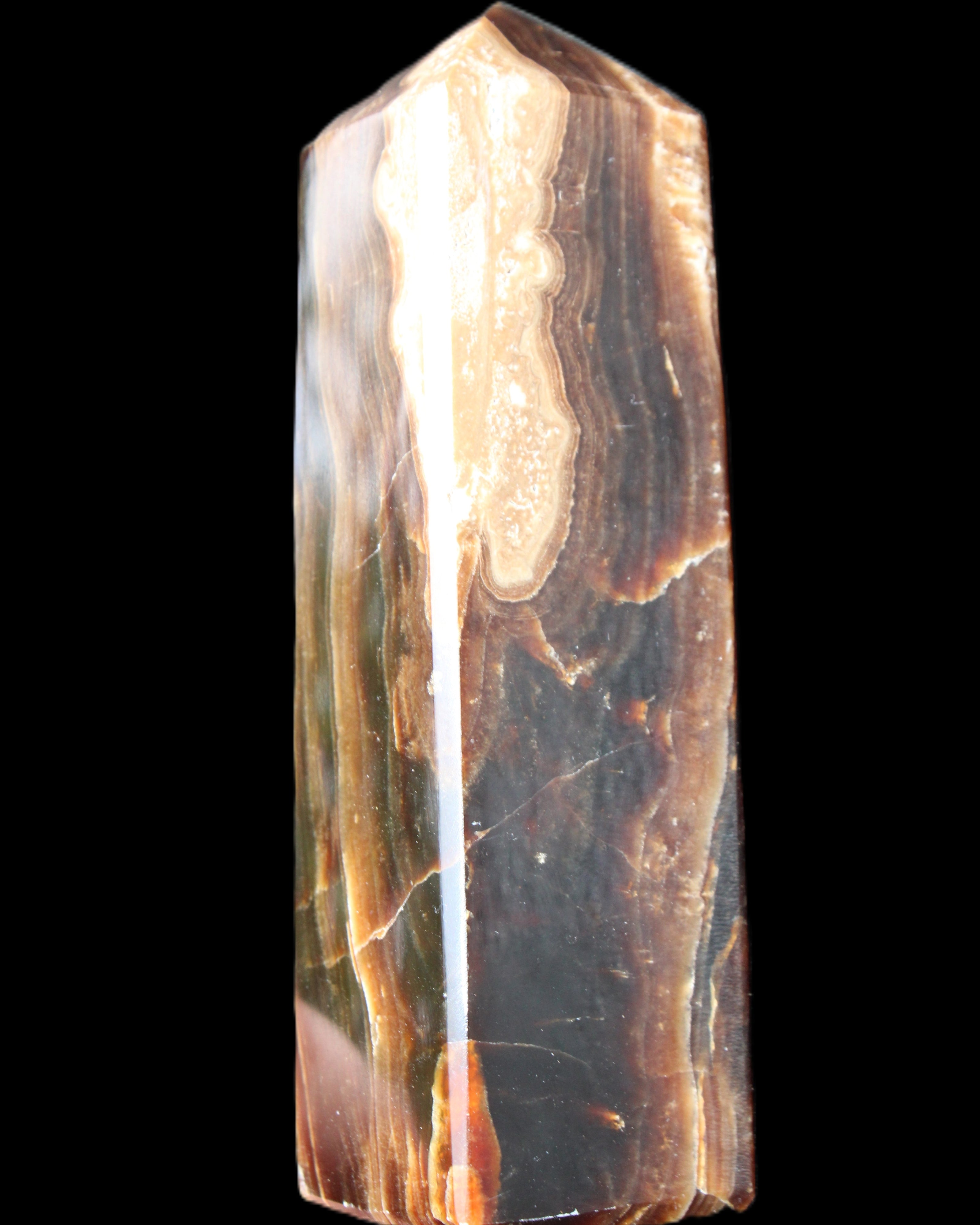 Chocolate Calcite obelisk 120*33*32mm 332g in sunlight - Rocks and Things Store