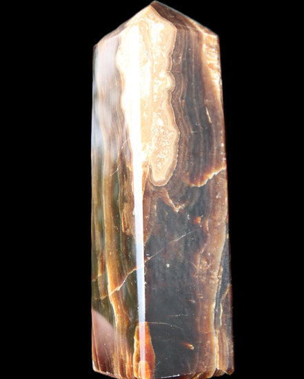 Chocolate Calcite obelisk 120*33*32mm 332g in sunlight - Rocks and Things Store