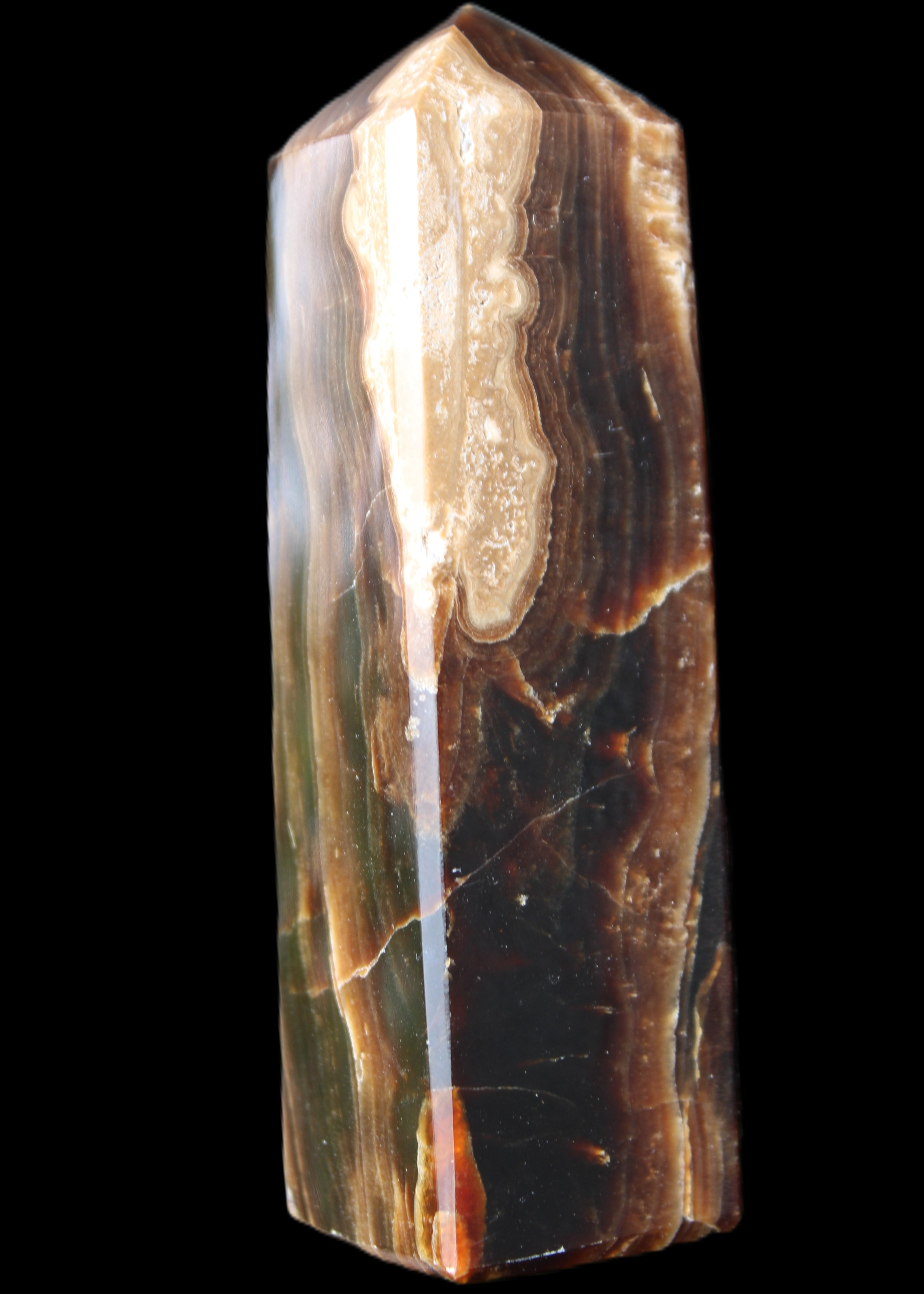 Chocolate Calcite obelisk 120*33*32mm 332g in sunlight - Rocks and Things Store