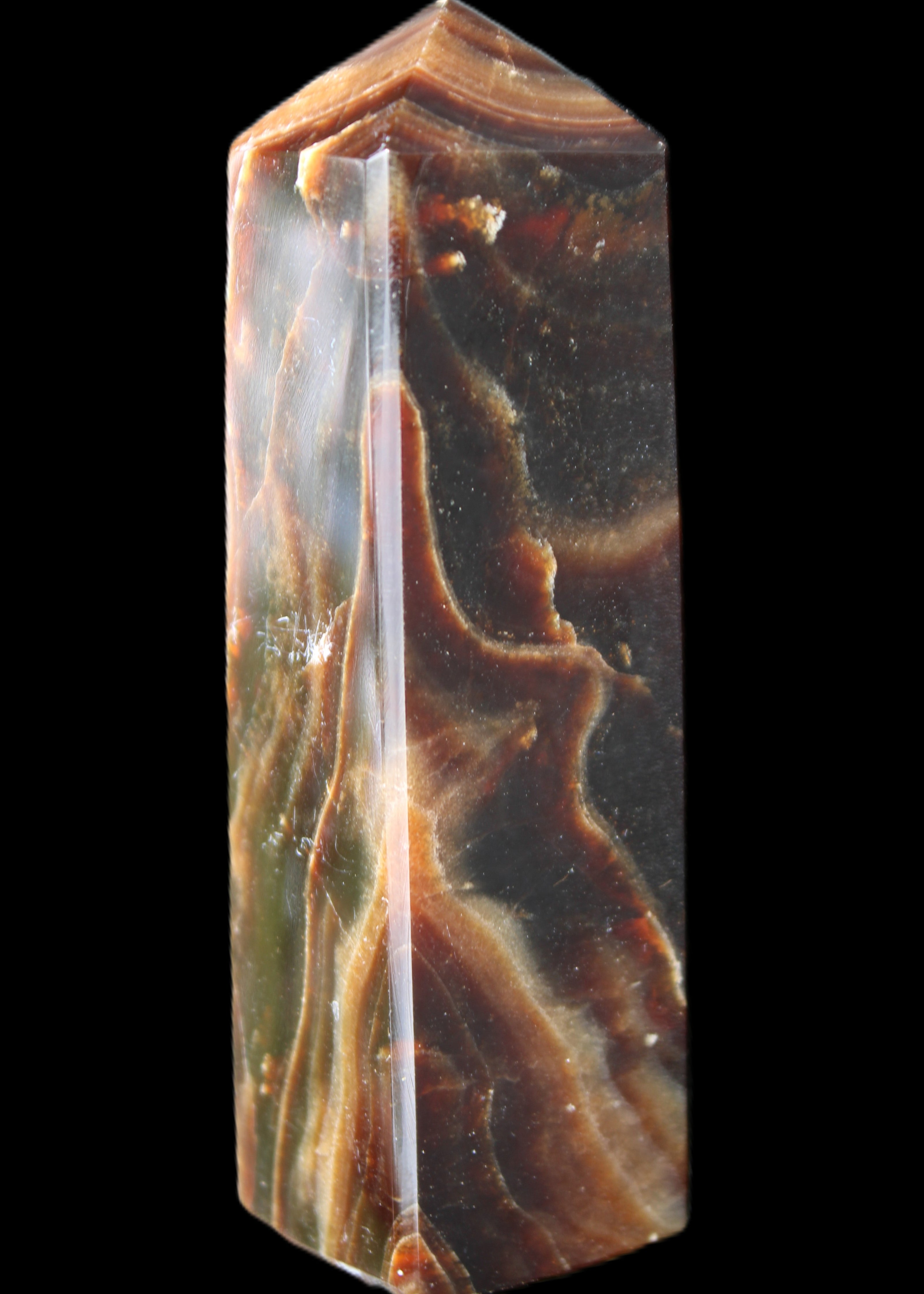Chocolate Calcite obelisk 120*33*32mm 332g in sunlight - Rocks and Things Store