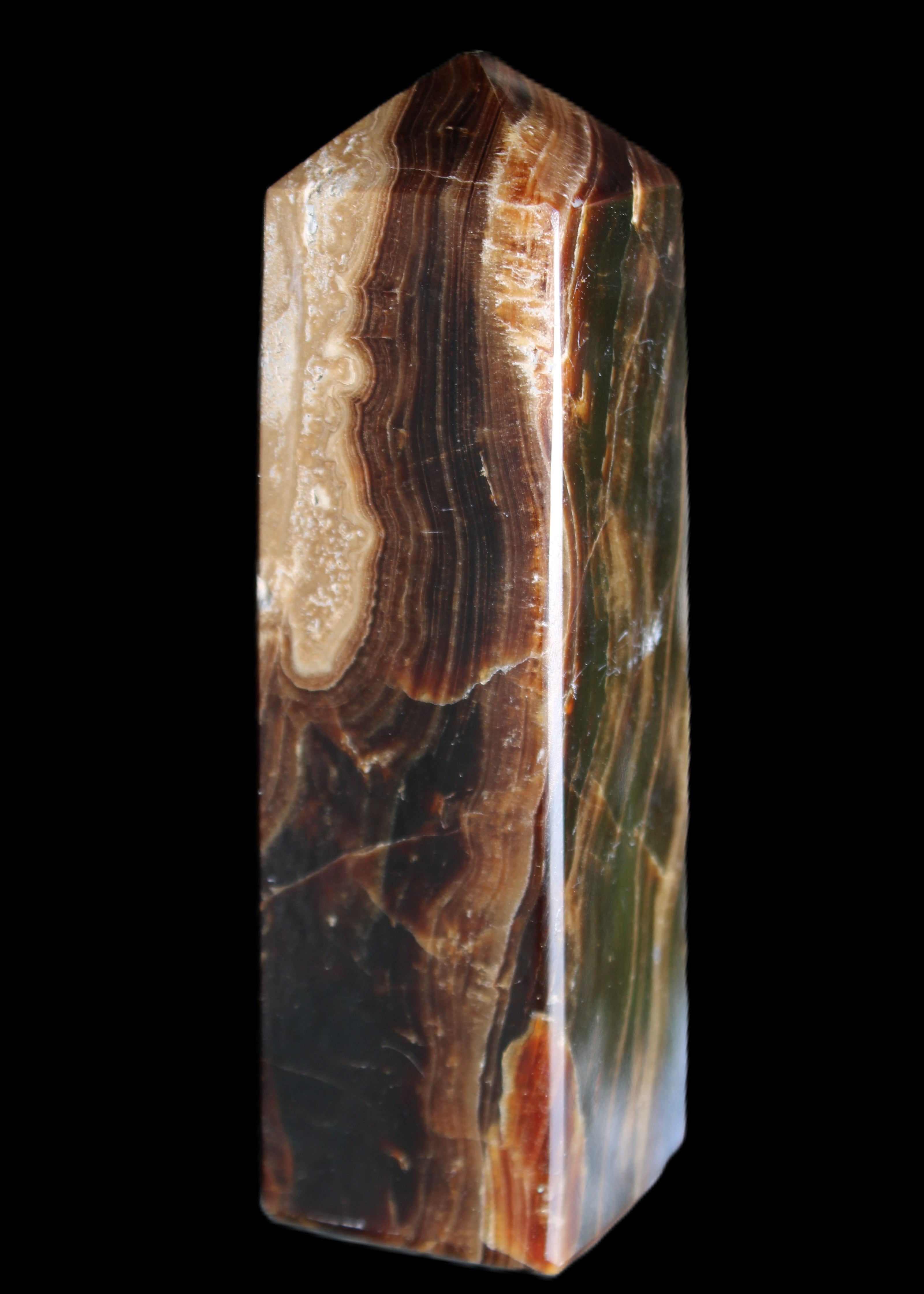 Chocolate Calcite obelisk 120*33*32mm 332g in sunlight - Rocks and Things Store