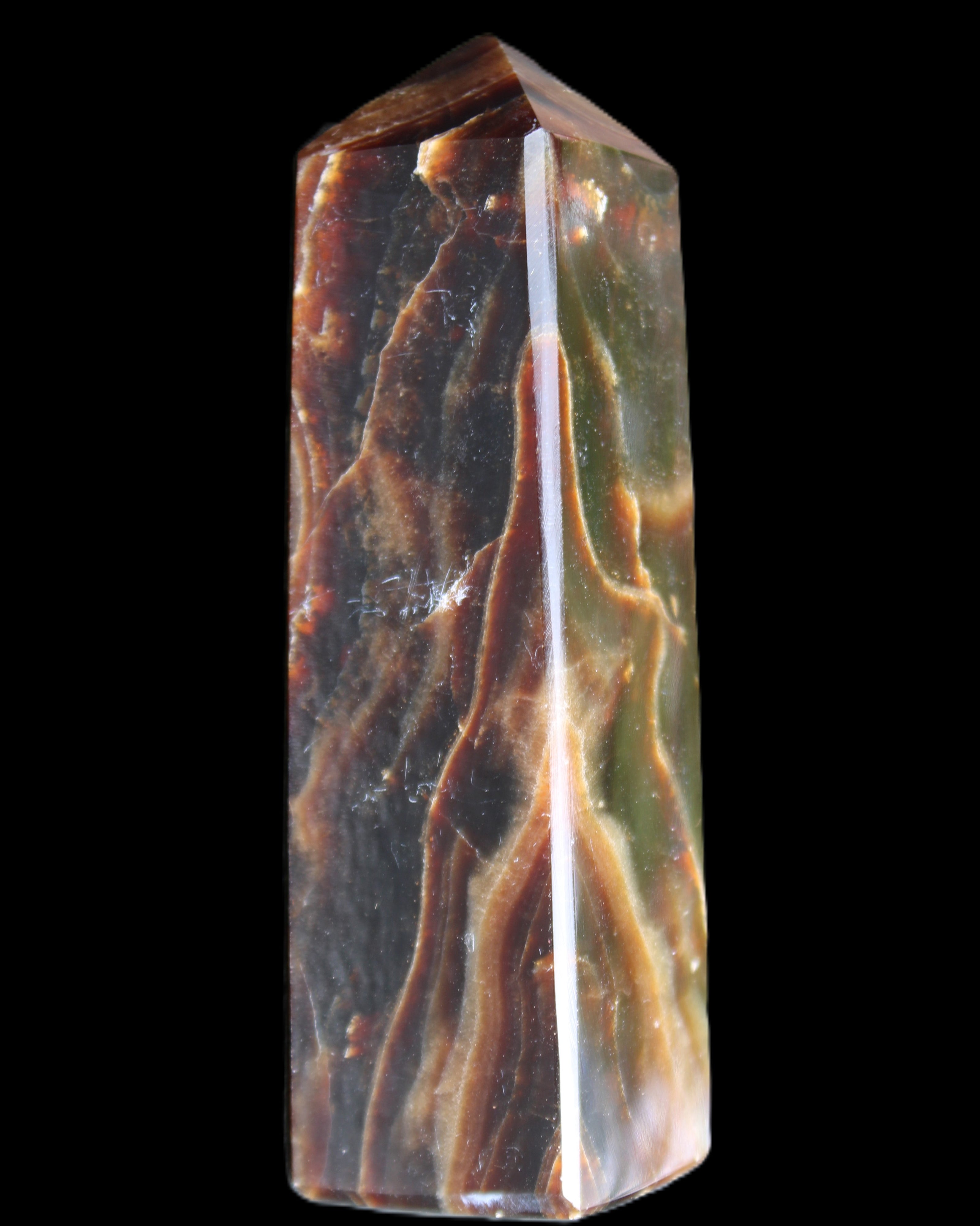 Chocolate Calcite obelisk 120*33*32mm 332g in sunlight - Rocks and Things Store