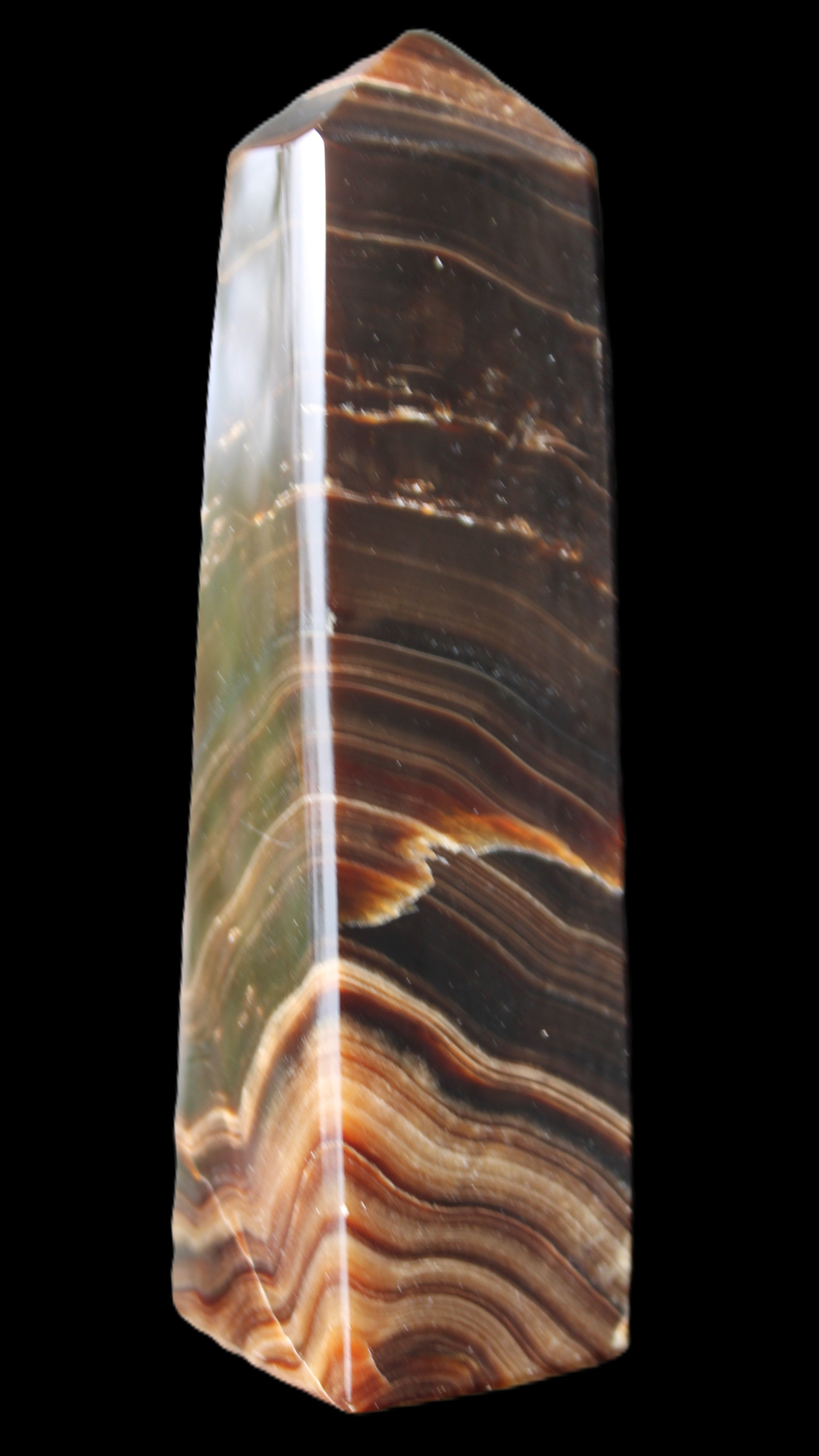 Chocolate Calcite obelisk 128*35*32mm 301g in sunlight - Rocks and Things Store