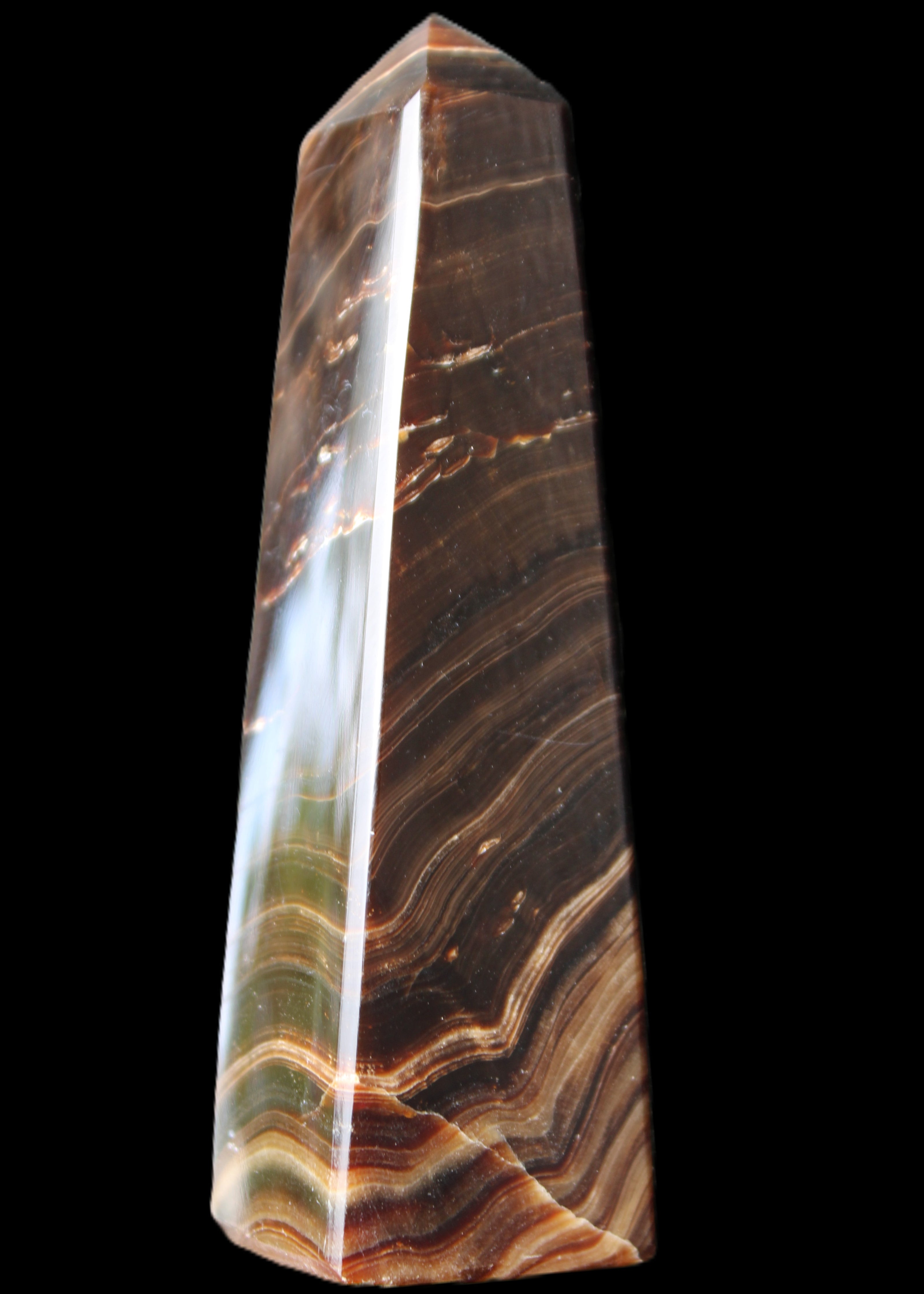 Chocolate Calcite obelisk 128*35*32mm 301g in sunlight - Rocks and Things Store