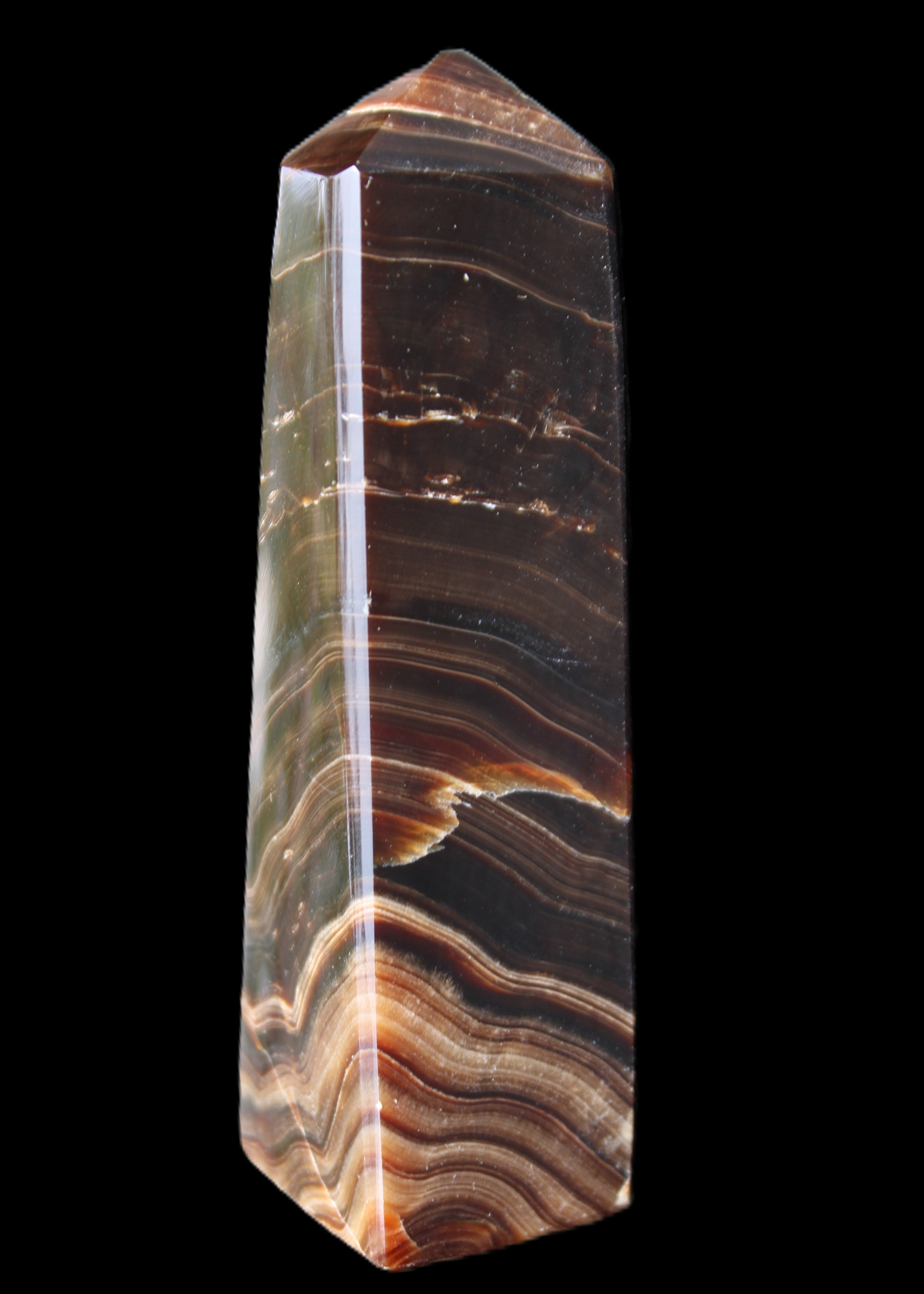 Chocolate Calcite obelisk 128*35*32mm 301g in sunlight - Rocks and Things Store