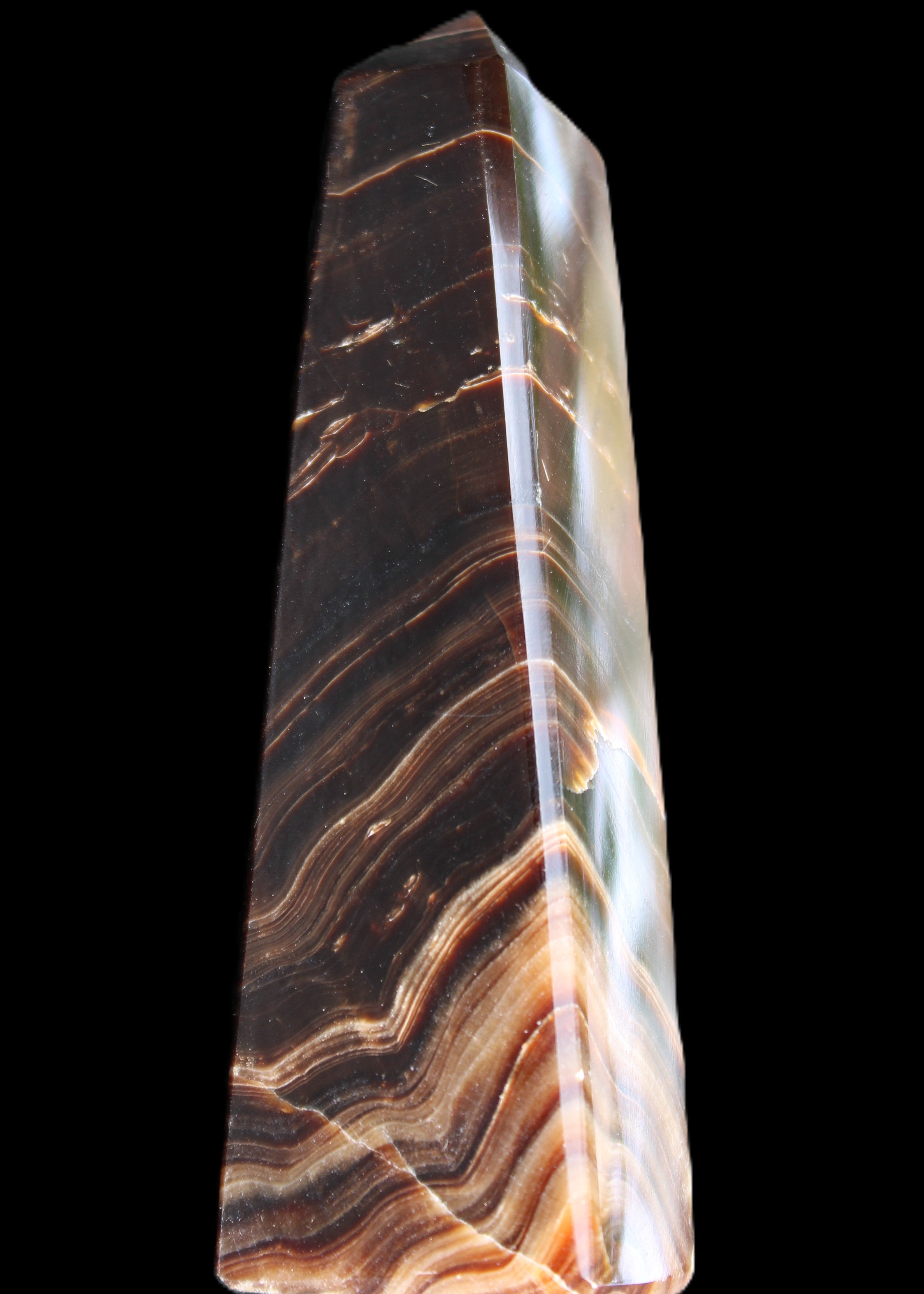 Chocolate Calcite obelisk 128*35*32mm 301g in sunlight - Rocks and Things Store