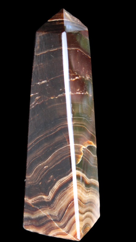 Chocolate Calcite obelisk 128*35*32mm 301g in sunlight - Rocks and Things Store