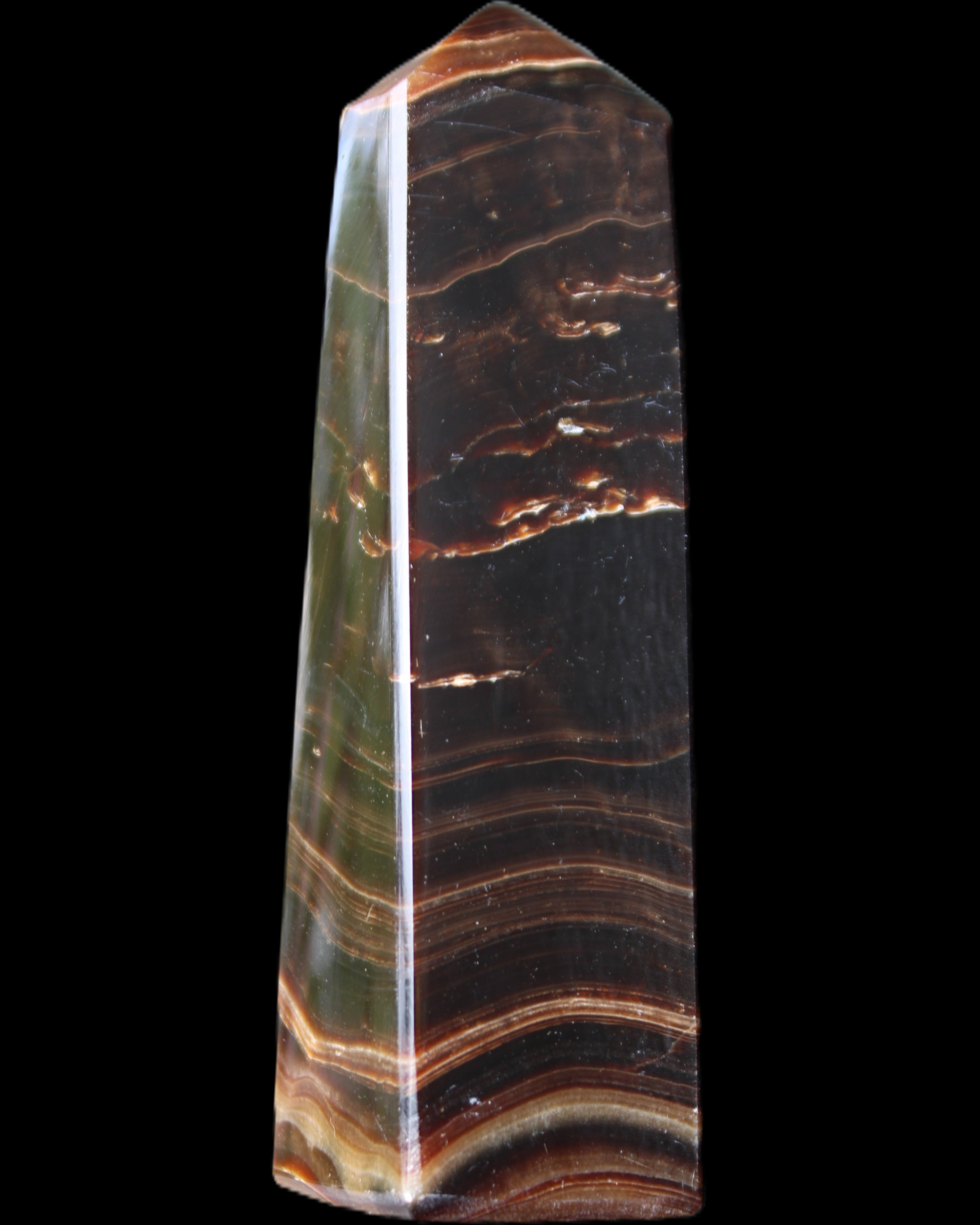 Chocolate Calcite obelisk 128*35*32mm 301g in sunlight - Rocks and Things Store