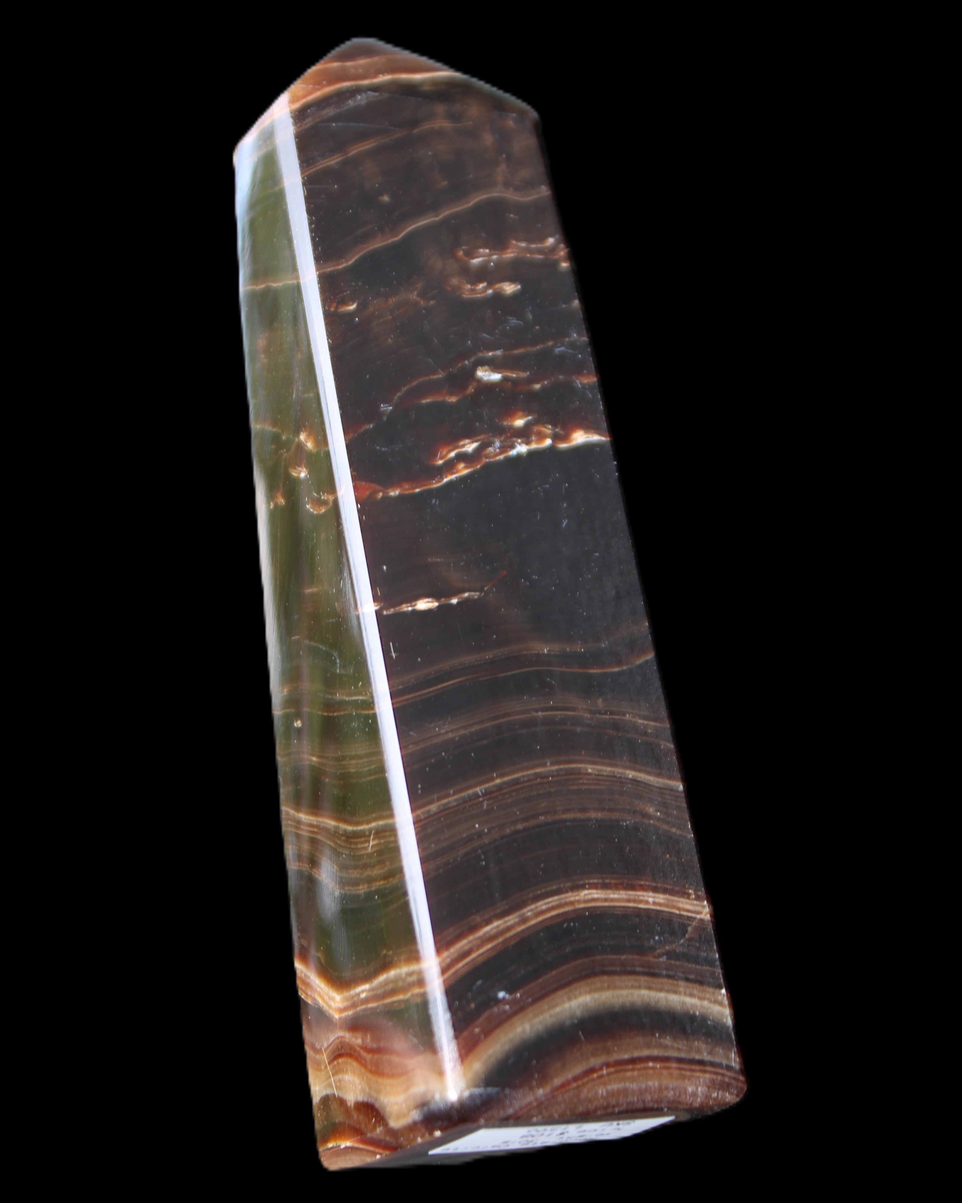 Chocolate Calcite obelisk 128*35*32mm 301g in sunlight - Rocks and Things Store