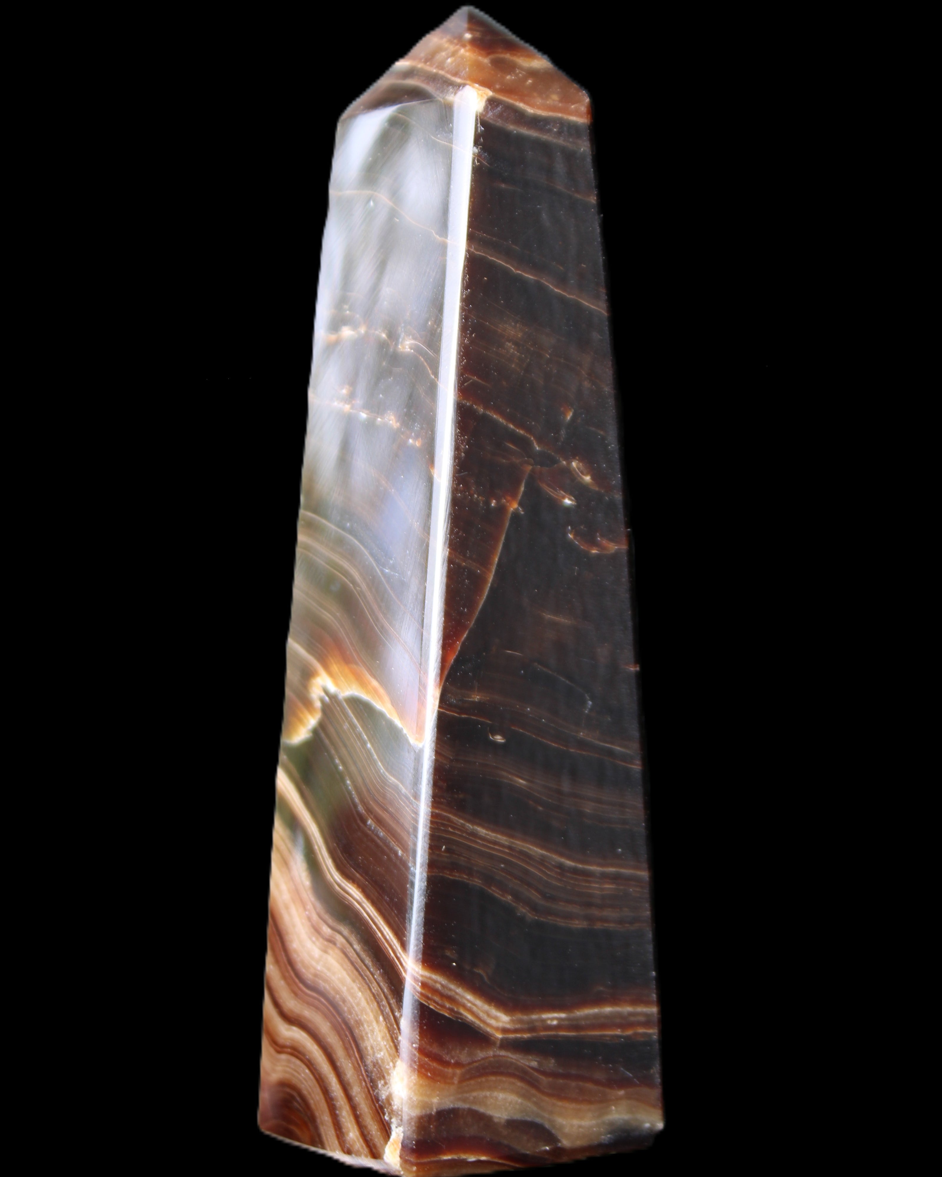 Chocolate Calcite obelisk 128*35*32mm 301g in sunlight - Rocks and Things Store