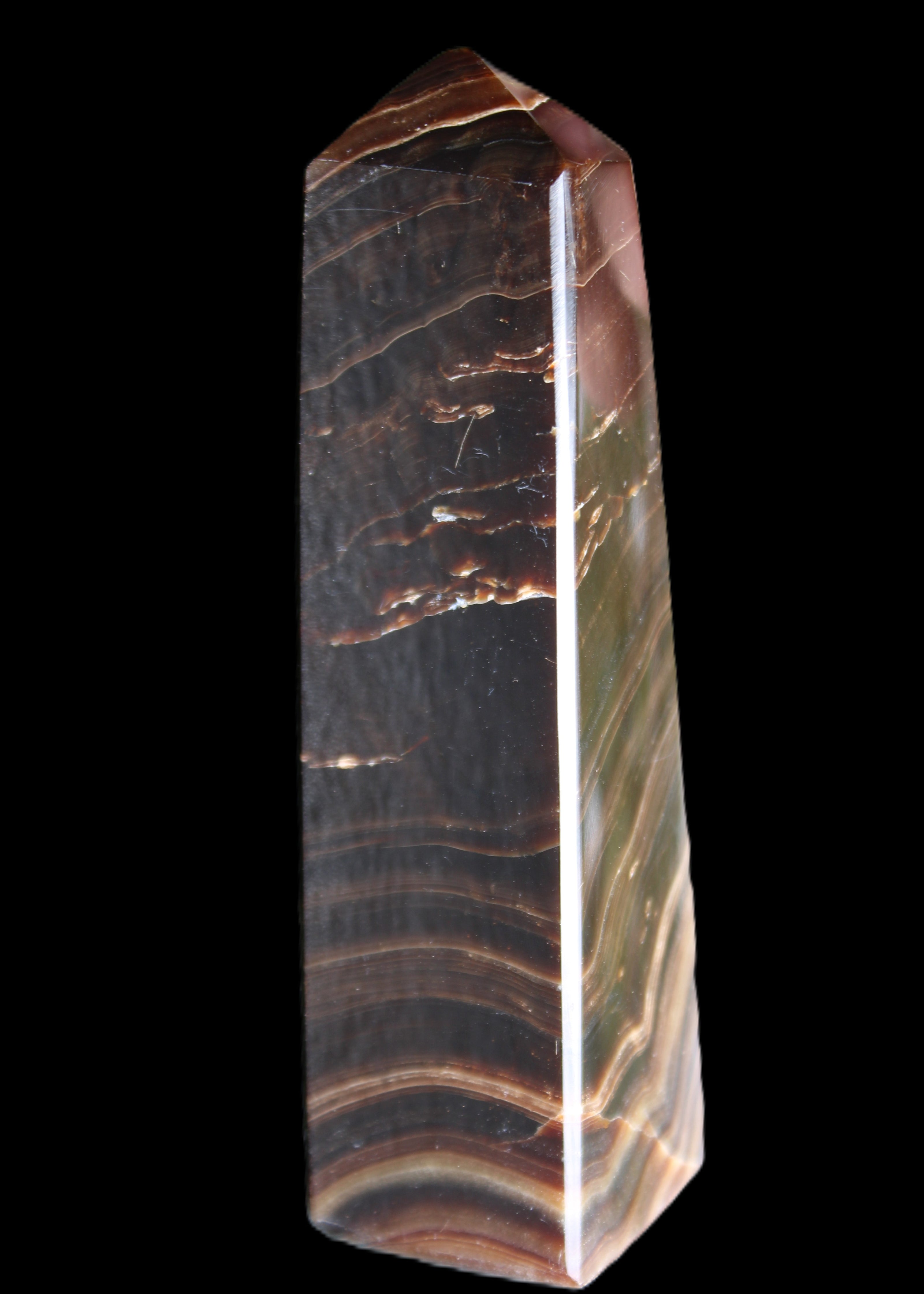 Chocolate Calcite obelisk 128*35*32mm 301g in sunlight - Rocks and Things Store