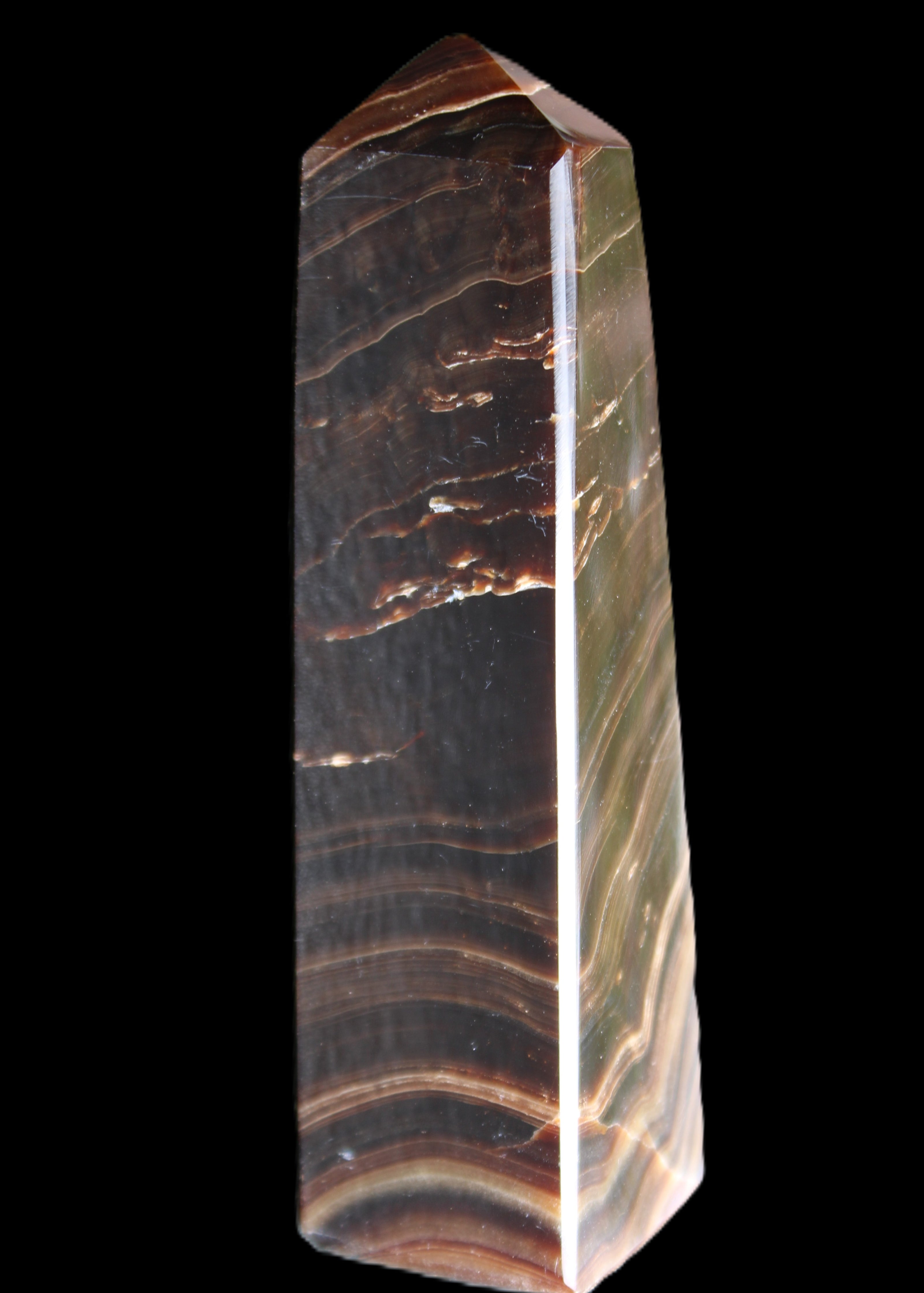 Chocolate Calcite obelisk 128*35*32mm 301g in sunlight - Rocks and Things Store