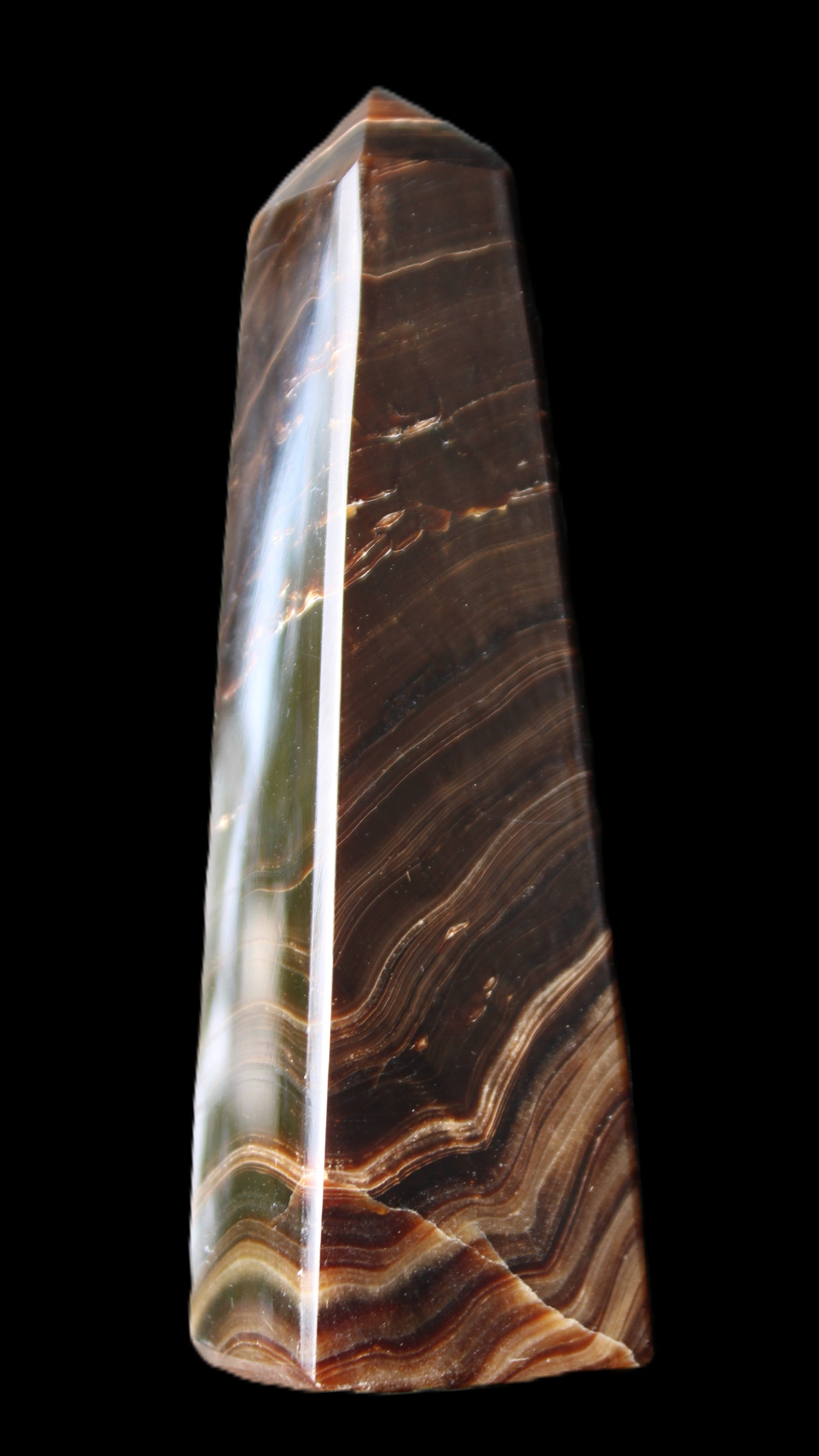 Chocolate Calcite obelisk 128*35*32mm 301g in sunlight - Rocks and Things Store