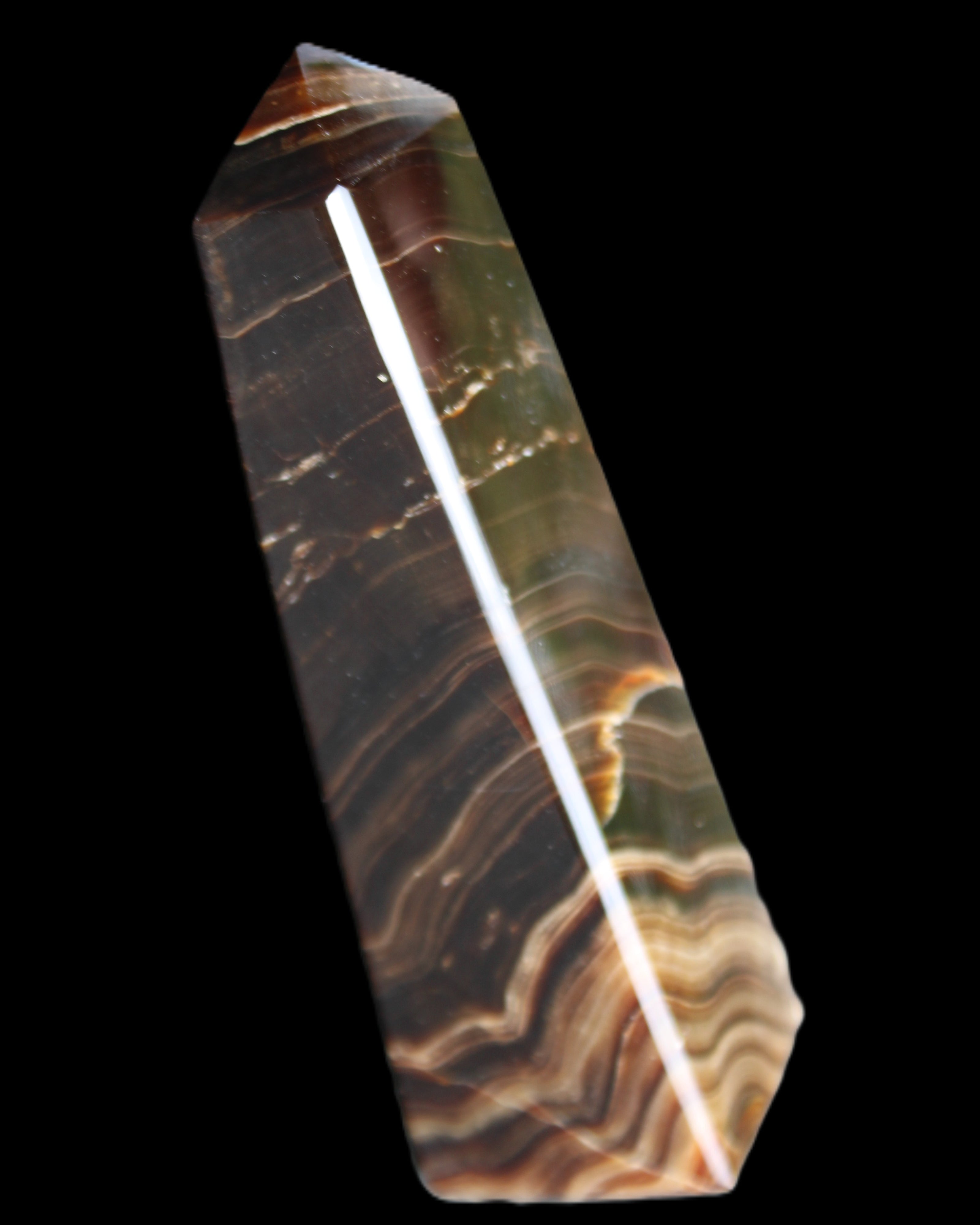Chocolate Calcite obelisk 128*35*32mm 301g in sunlight - Rocks and Things Store