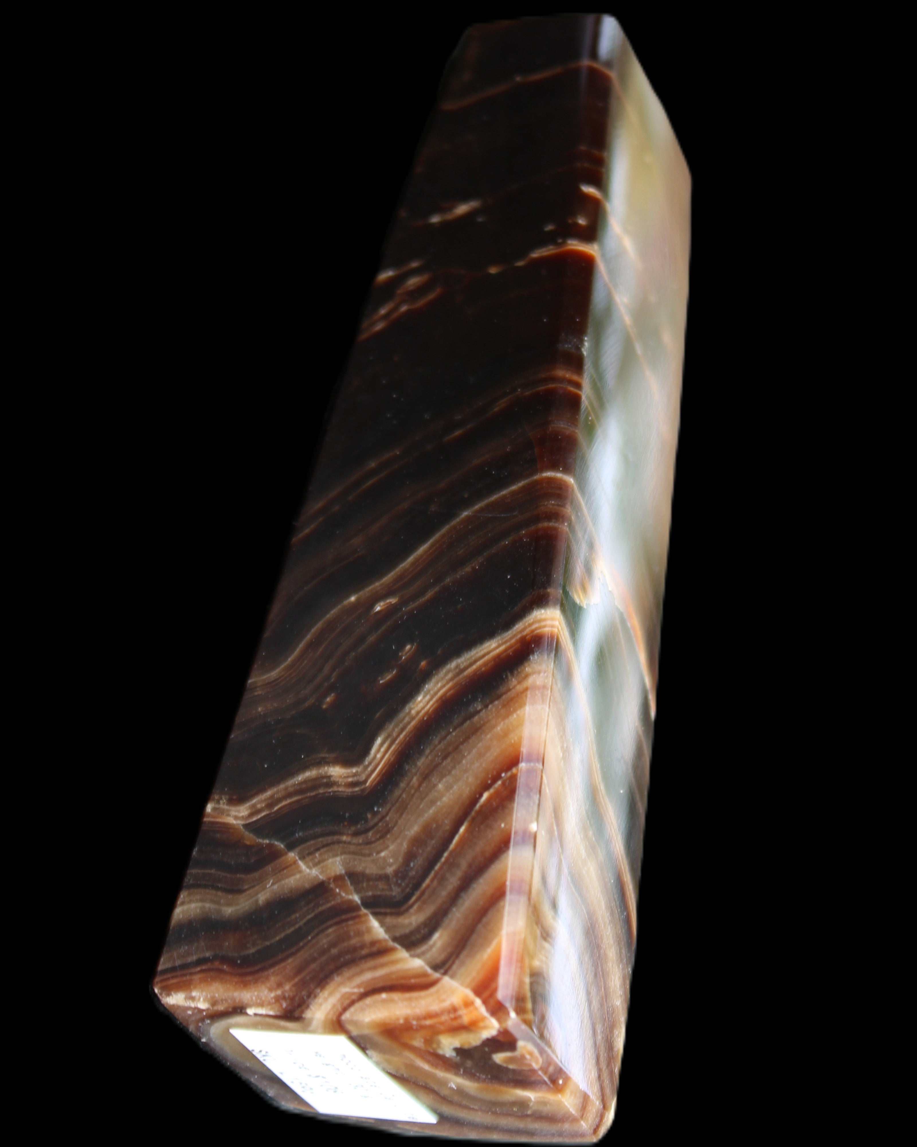 Chocolate Calcite obelisk 128*35*32mm 301g in sunlight - Rocks and Things Store