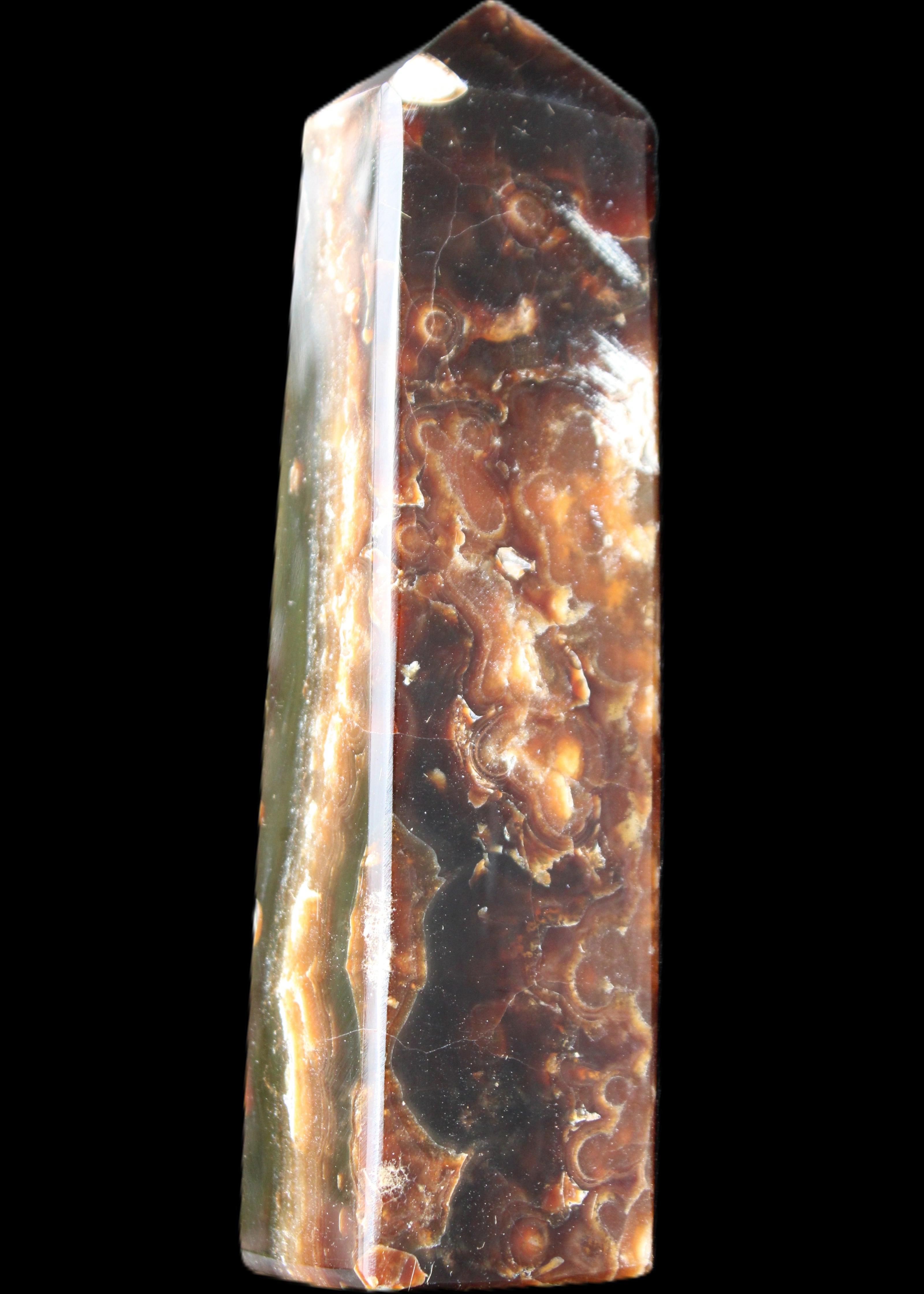 Chocolate Calcite obelisk 132*30*28mm 282g in sunlight - Rocks and Things Store
