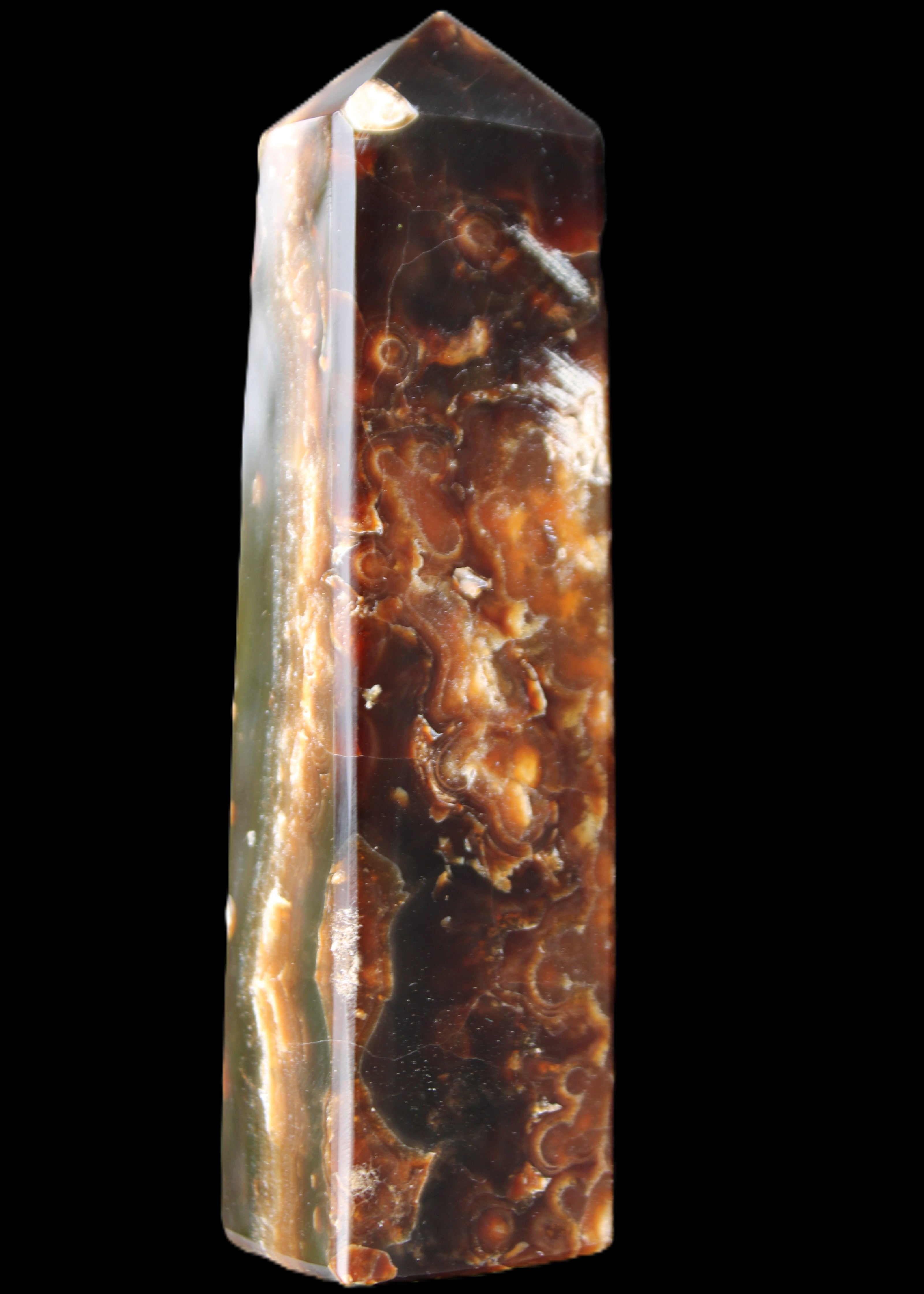 Chocolate Calcite obelisk 132*30*28mm 282g in sunlight - Rocks and Things Store