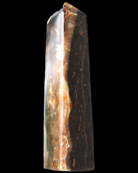 Chocolate Calcite obelisk 132*30*28mm 282g in sunlight - Rocks and Things Store