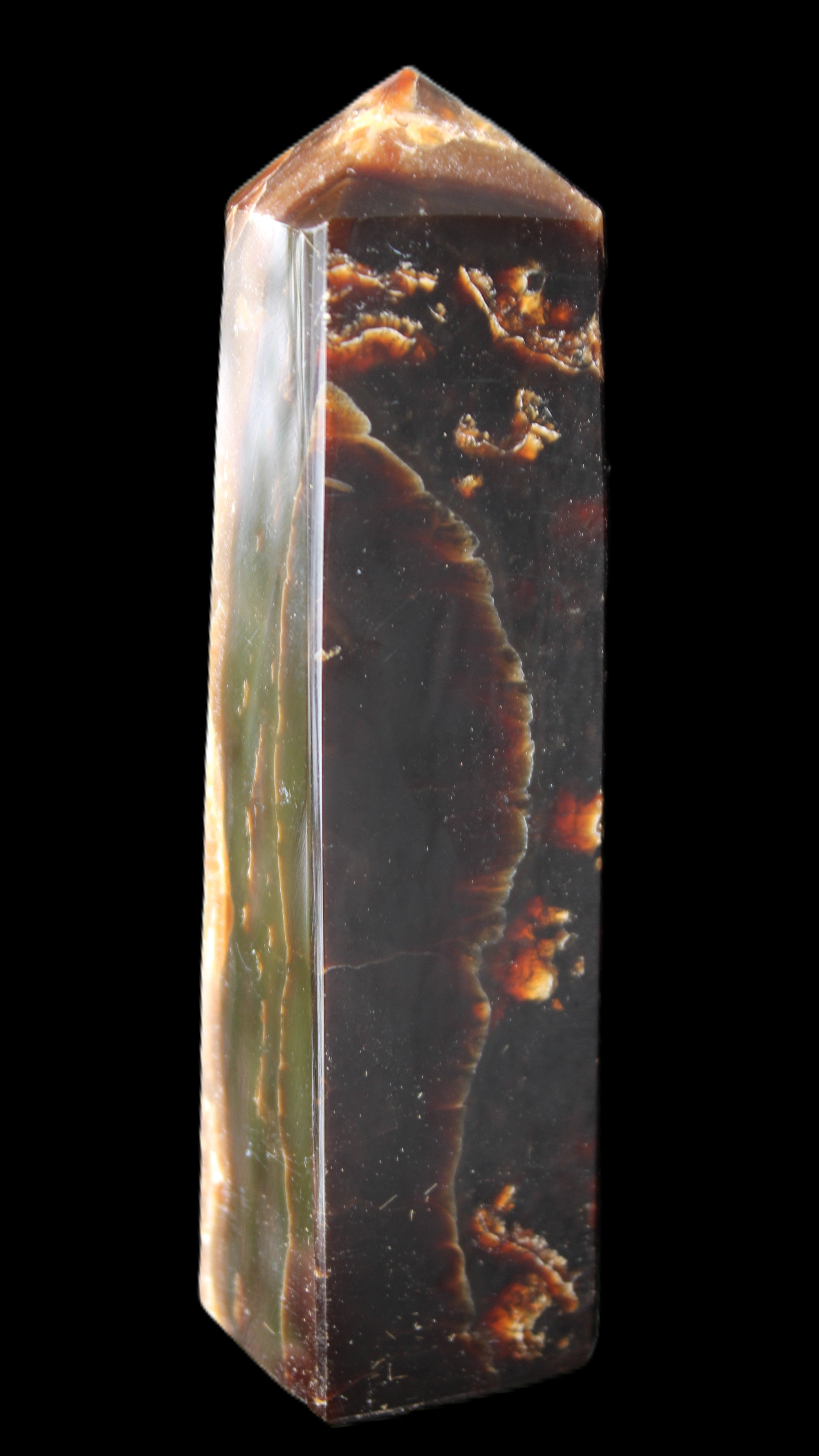 Chocolate Calcite obelisk 132*30*28mm 282g in sunlight - Rocks and Things Store