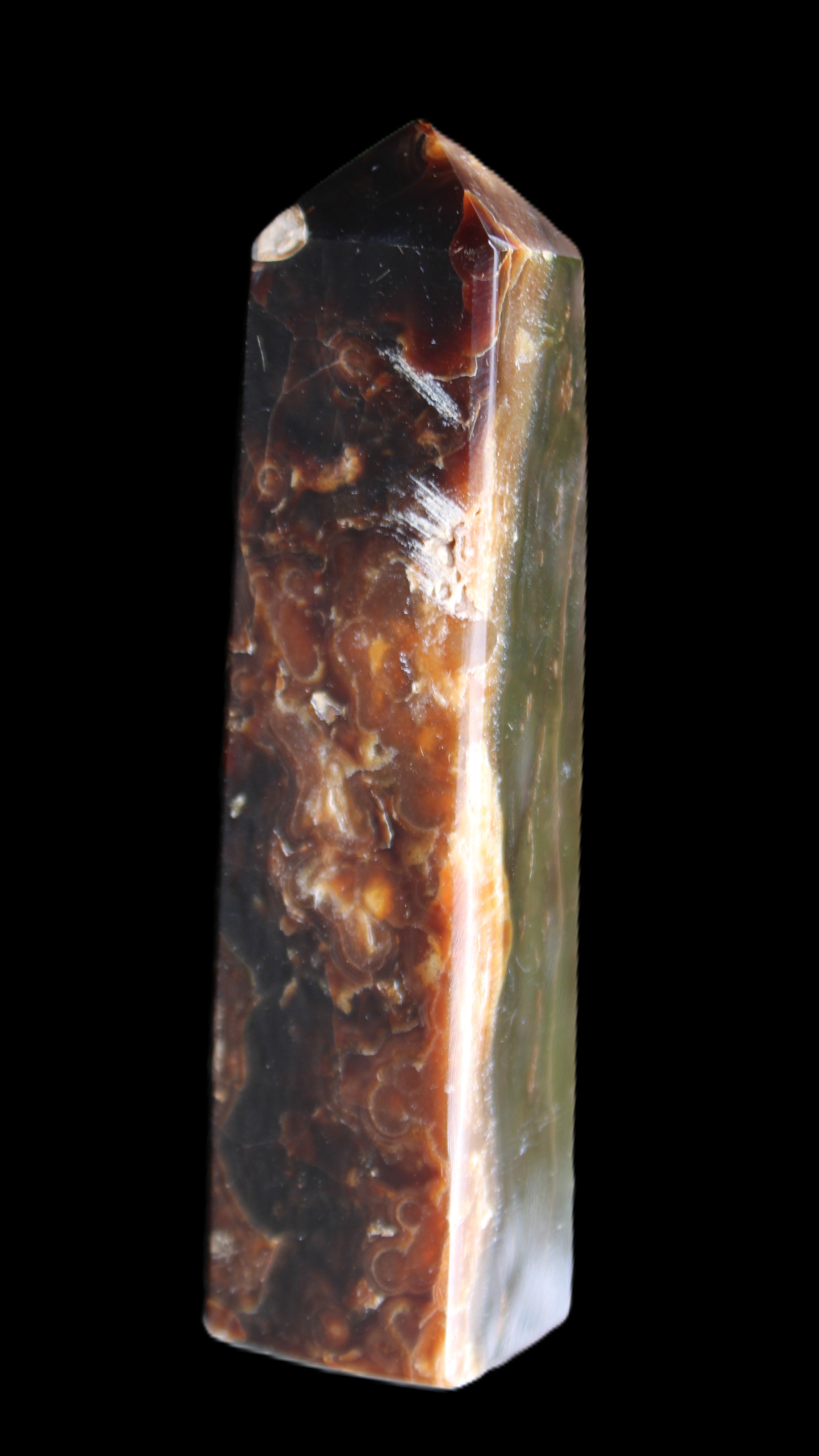 Chocolate Calcite obelisk 132*30*28mm 282g in sunlight - Rocks and Things Store