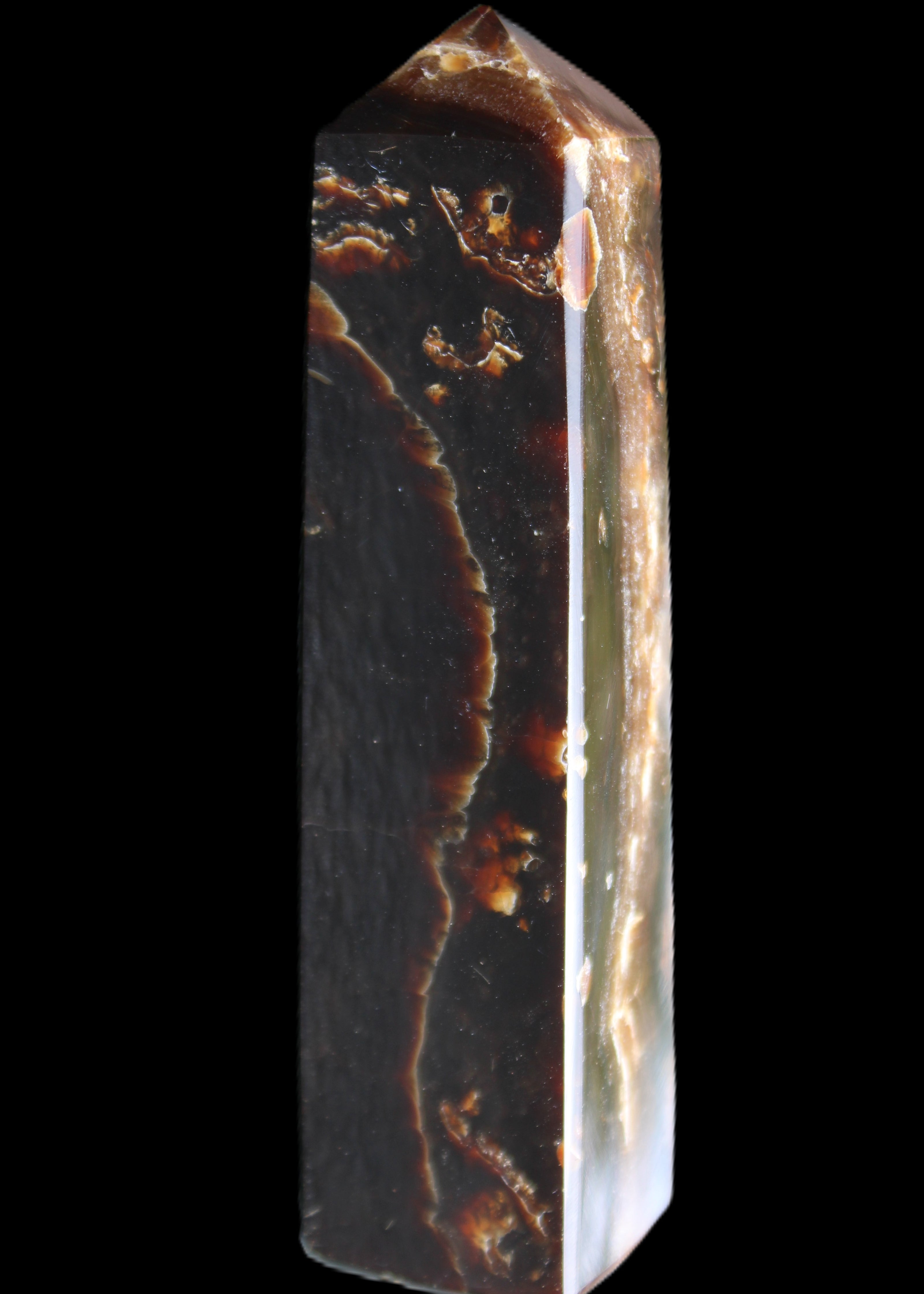 Chocolate Calcite obelisk 132*30*28mm 282g in sunlight - Rocks and Things Store