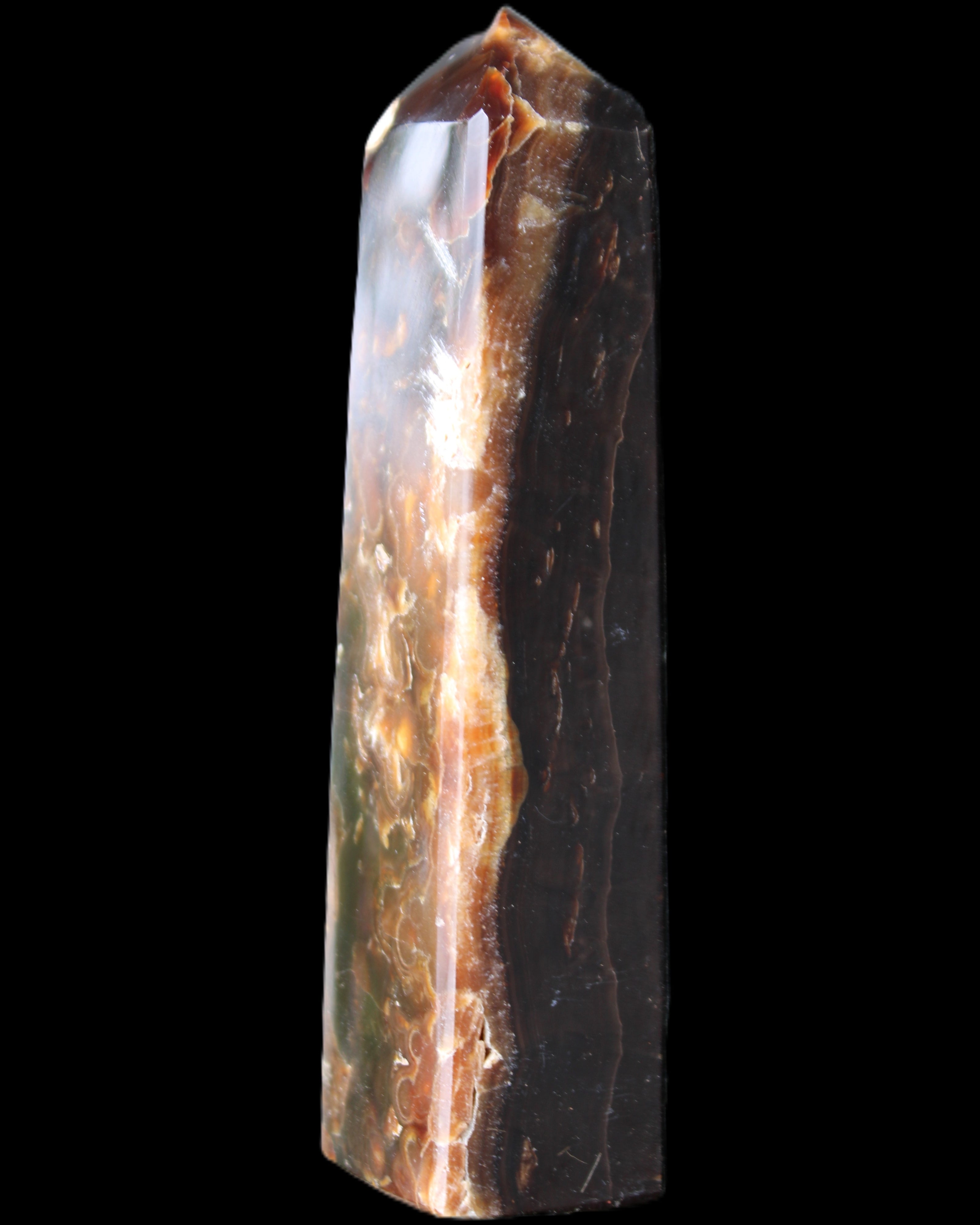 Chocolate Calcite obelisk 132*30*28mm 282g in sunlight - Rocks and Things Store