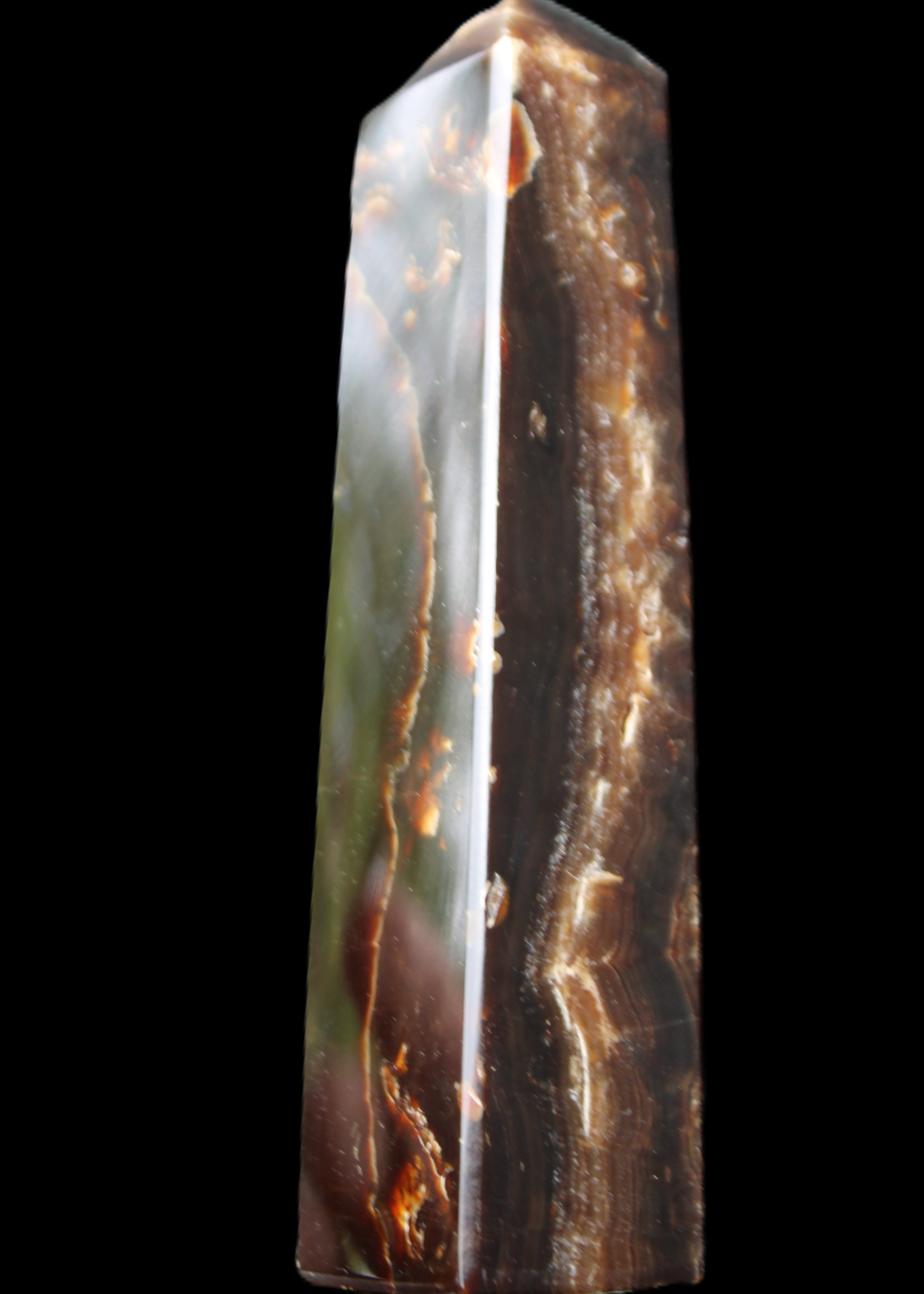 Chocolate Calcite obelisk 132*30*28mm 282g in sunlight - Rocks and Things Store
