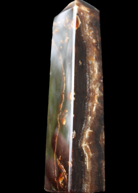 Chocolate Calcite obelisk 132*30*28mm 282g in sunlight - Rocks and Things Store