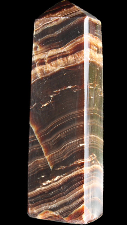 Chocolate Calcite obelisk 113*33*21mm 201g in sunlight - Rocks and Things Store