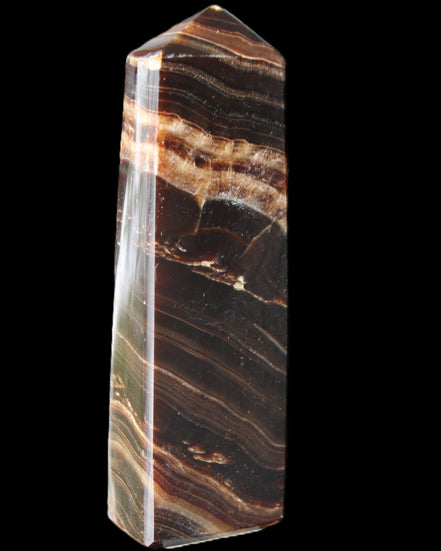 Chocolate Calcite obelisk 113*33*21mm 201g in sunlight - Rocks and Things Store
