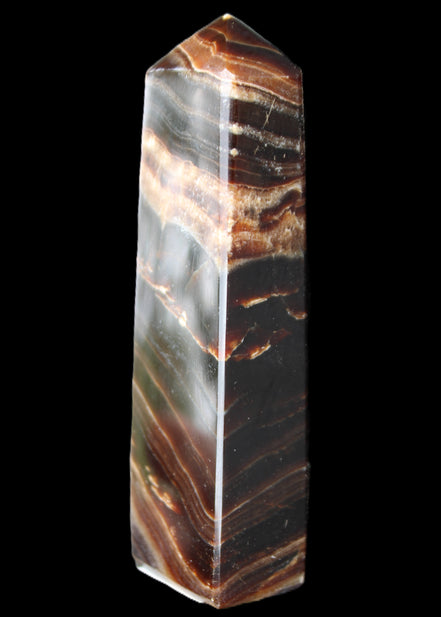 Chocolate Calcite obelisk 113*33*21mm 201g in sunlight - Rocks and Things Store