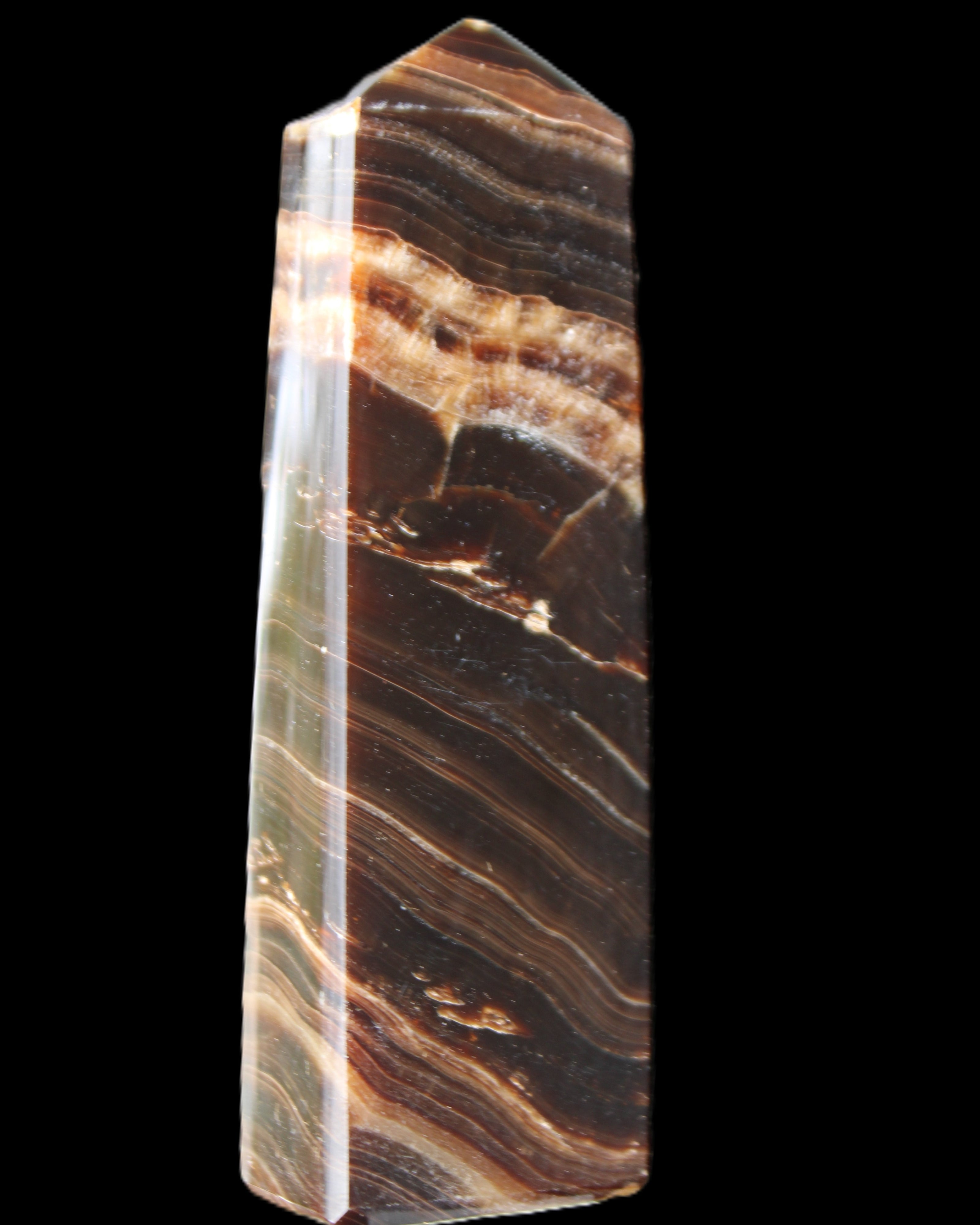 Chocolate Calcite obelisk 113*33*21mm 201g in sunlight - Rocks and Things Store