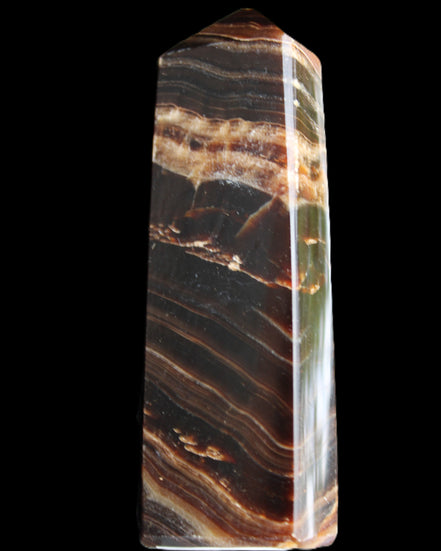 Chocolate Calcite obelisk 113*33*21mm 201g in sunlight - Rocks and Things Store