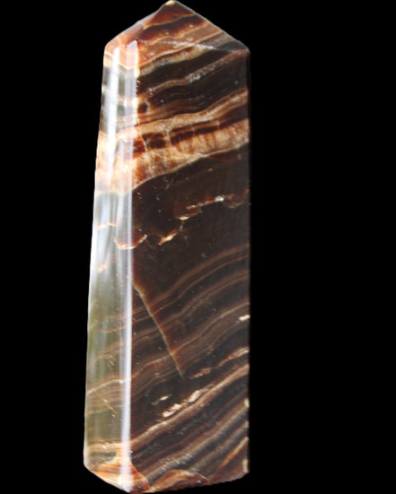 Chocolate Calcite obelisk 113*33*21mm 201g in sunlight - Rocks and Things Store