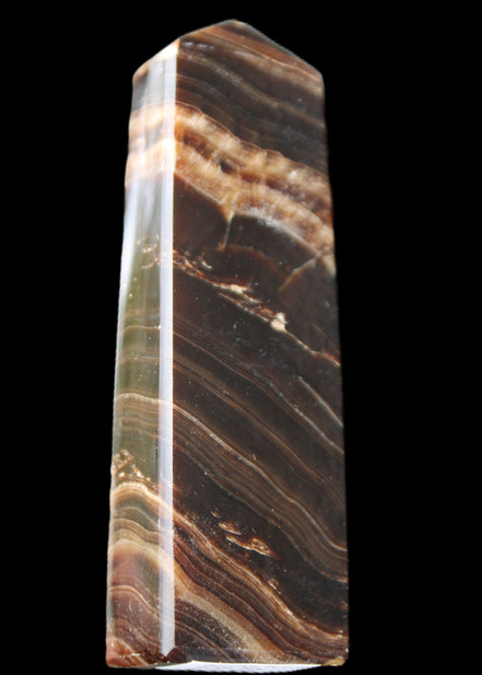 Chocolate Calcite obelisk 113*33*21mm 201g in sunlight - Rocks and Things Store