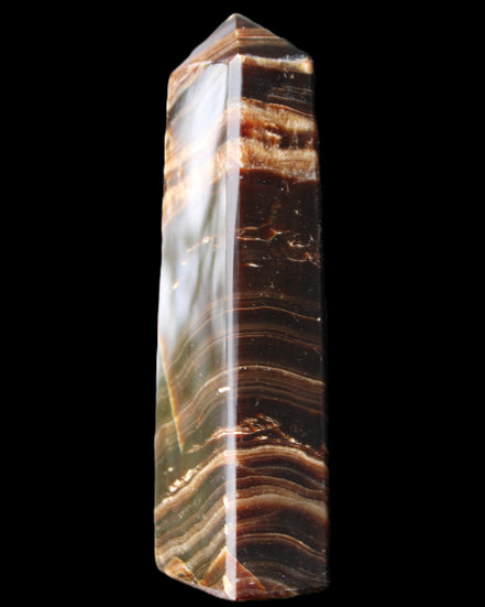 Chocolate Calcite obelisk 113*33*21mm 201g in sunlight - Rocks and Things Store